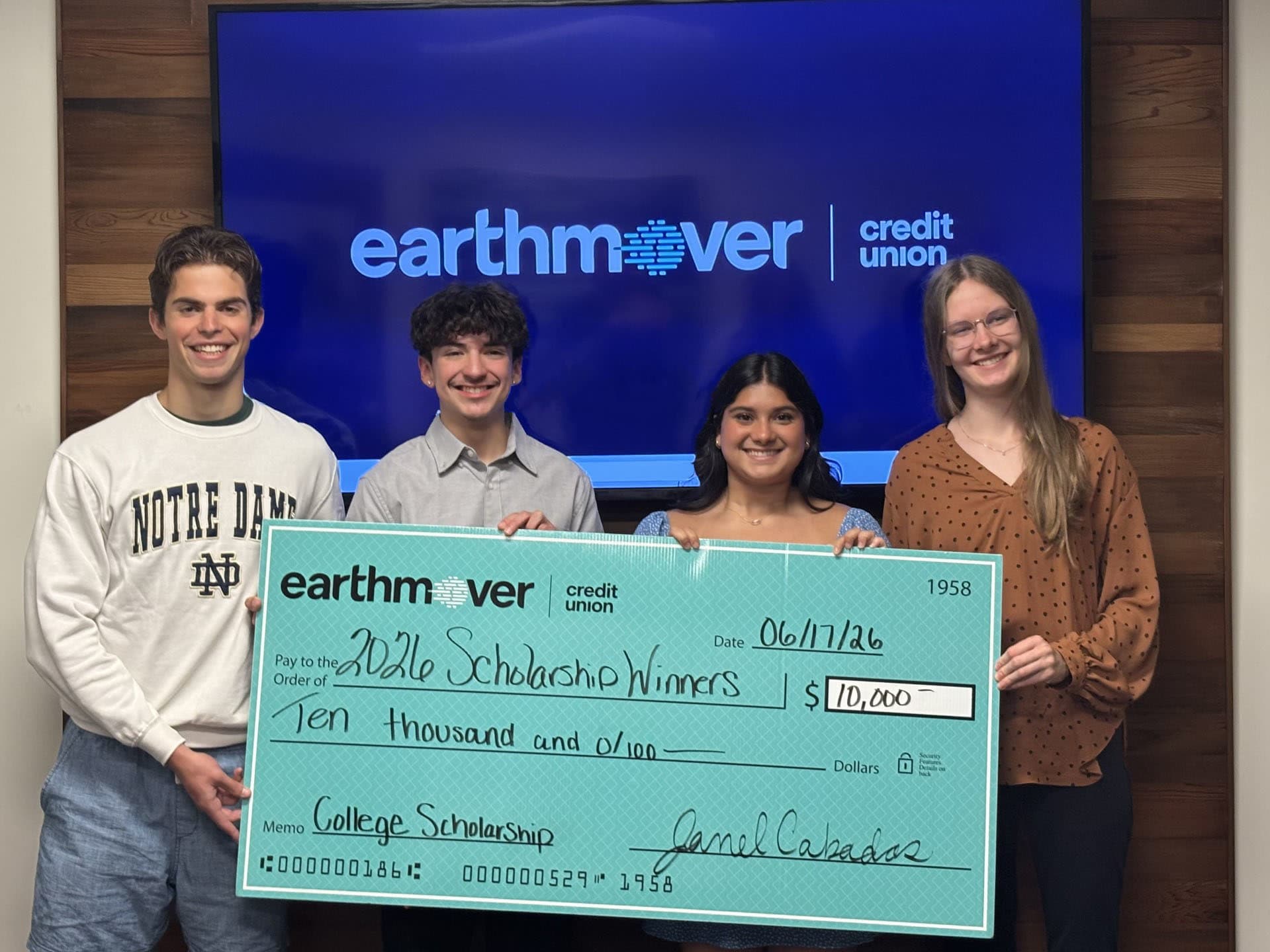 Group of people with check