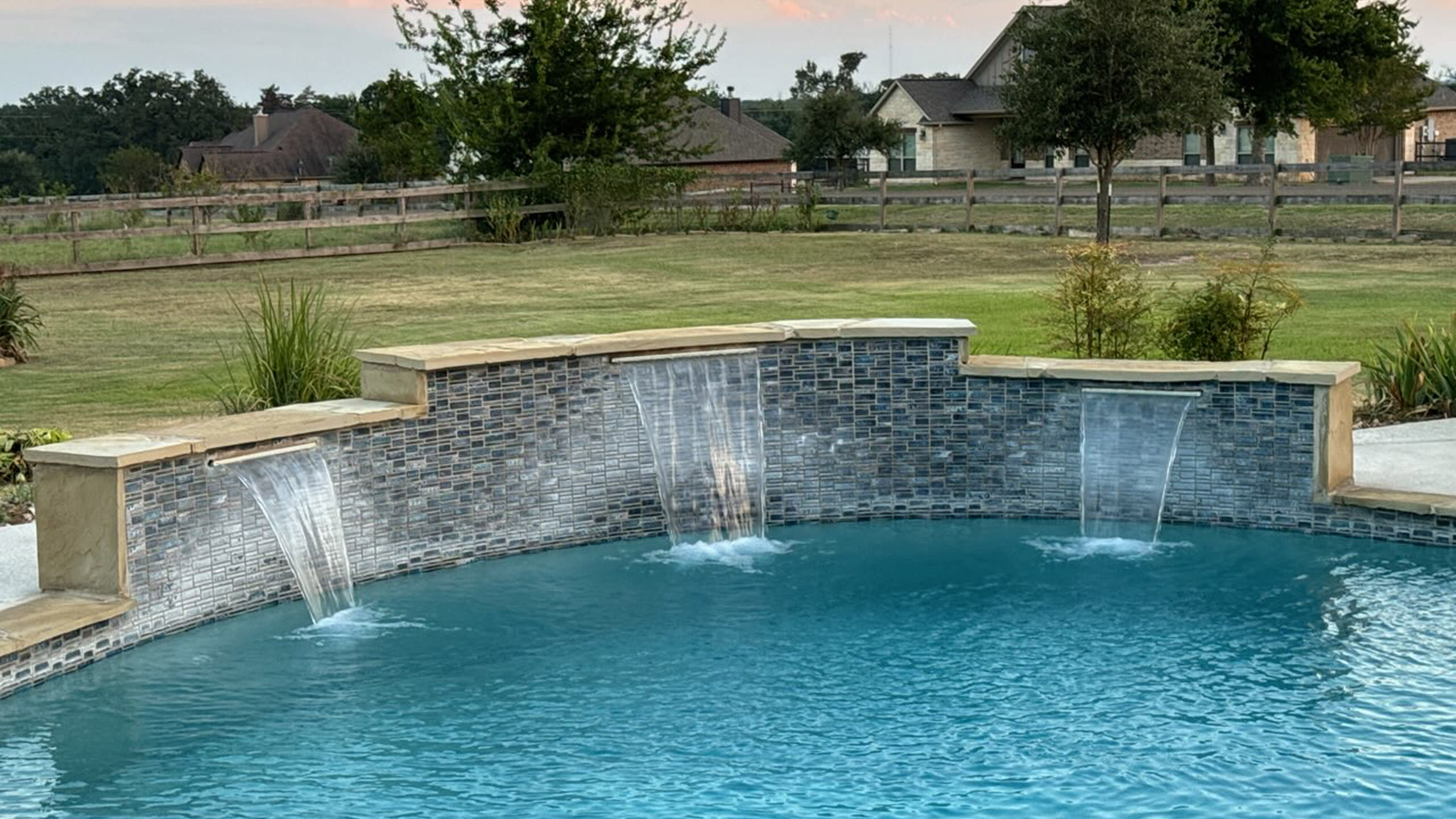 Pool with a waterfall feature