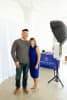 Husband and wife founders Shannon and Chris Teguh standing beside a Beyond the Booth photo booth setup.