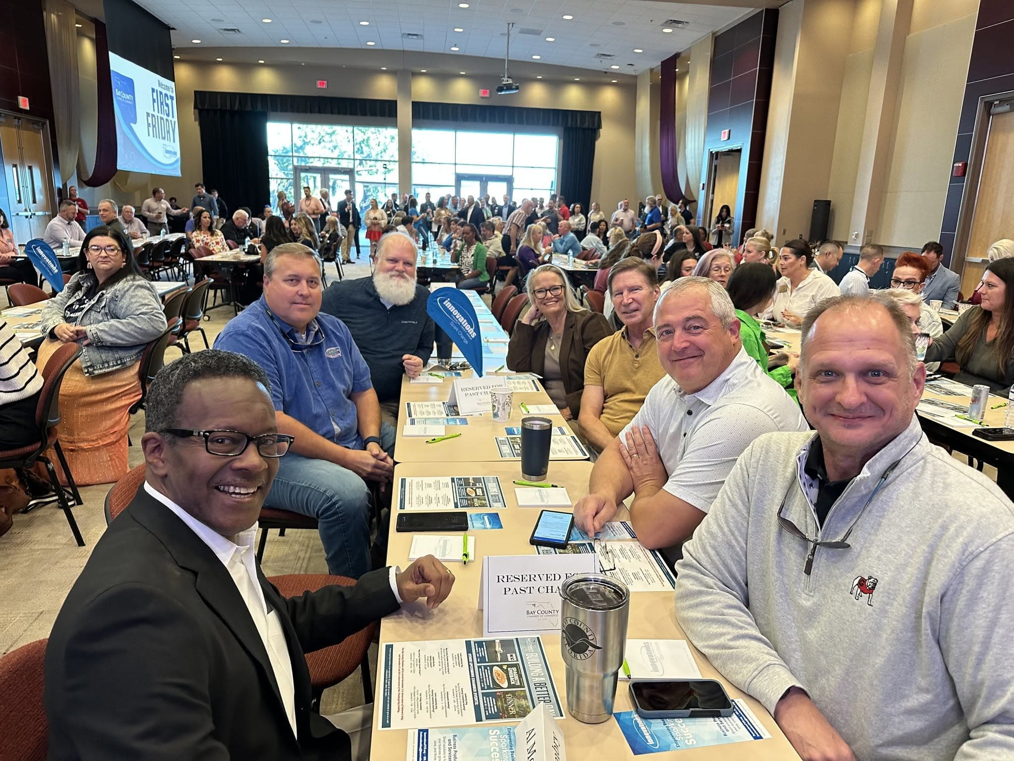 Chamber Members smiling at the Chamber's First Friday Event
