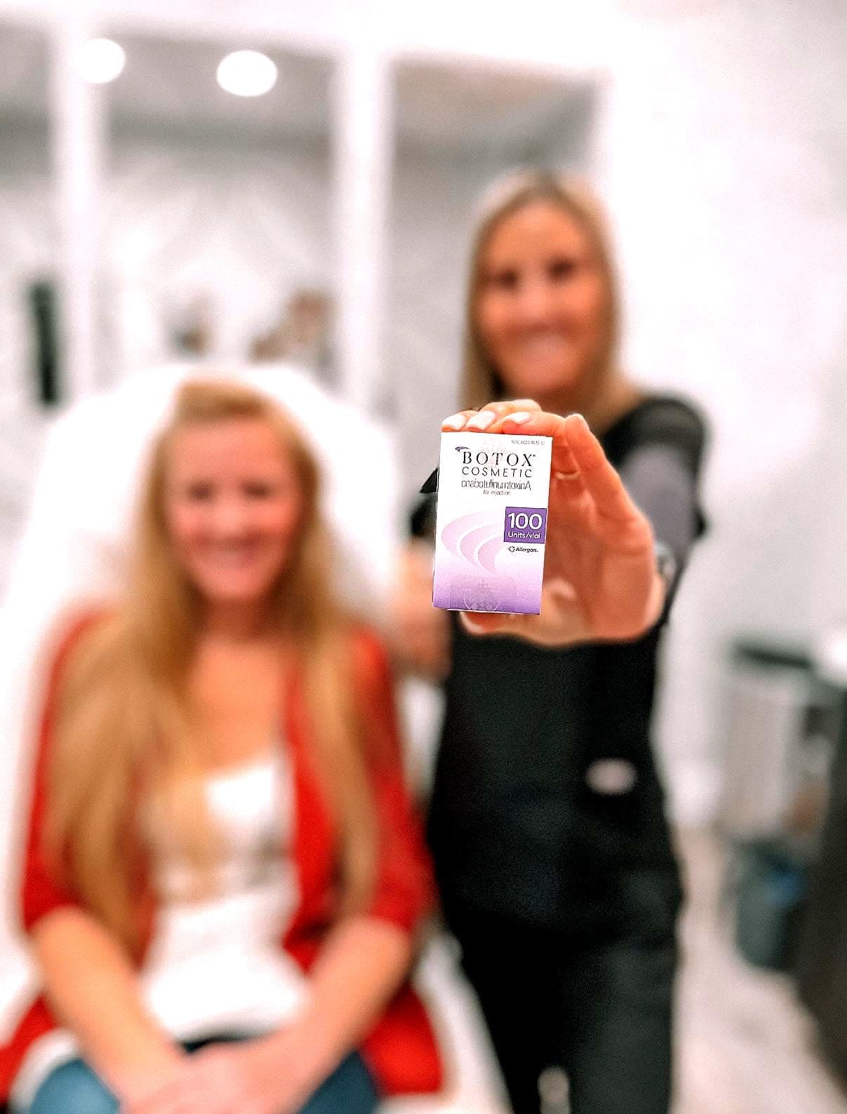 Refresh - Aesthetics & Wellness provider holding a Botox Cosmetic box with a patient in a Florida treatment room
