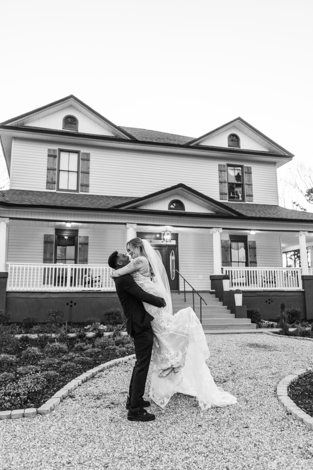 couple portrait in front of historic estate wedding venue South Carolina