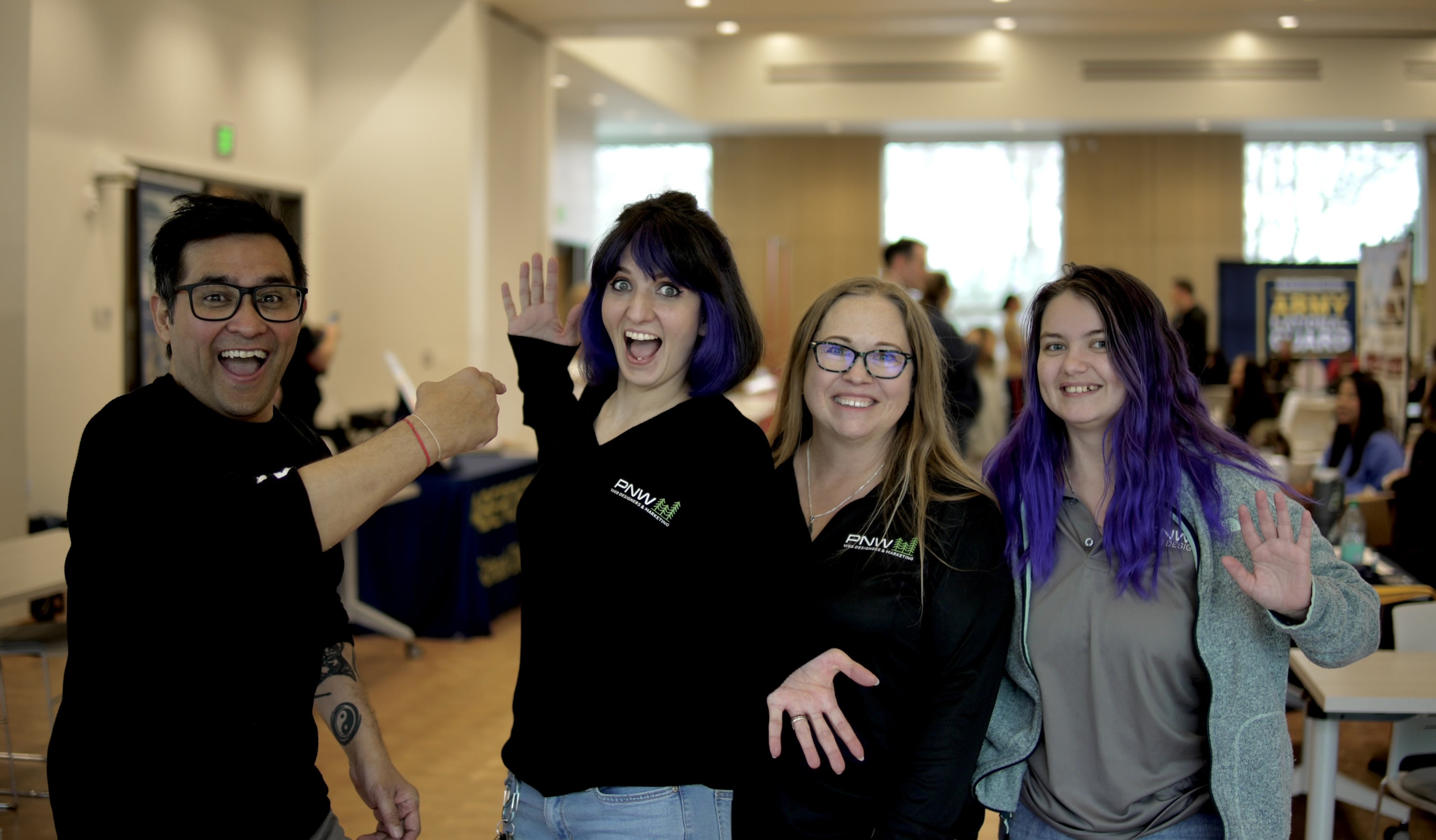 PNW Web Designers & Marketing team at an event helping businesses with web design and marketing services