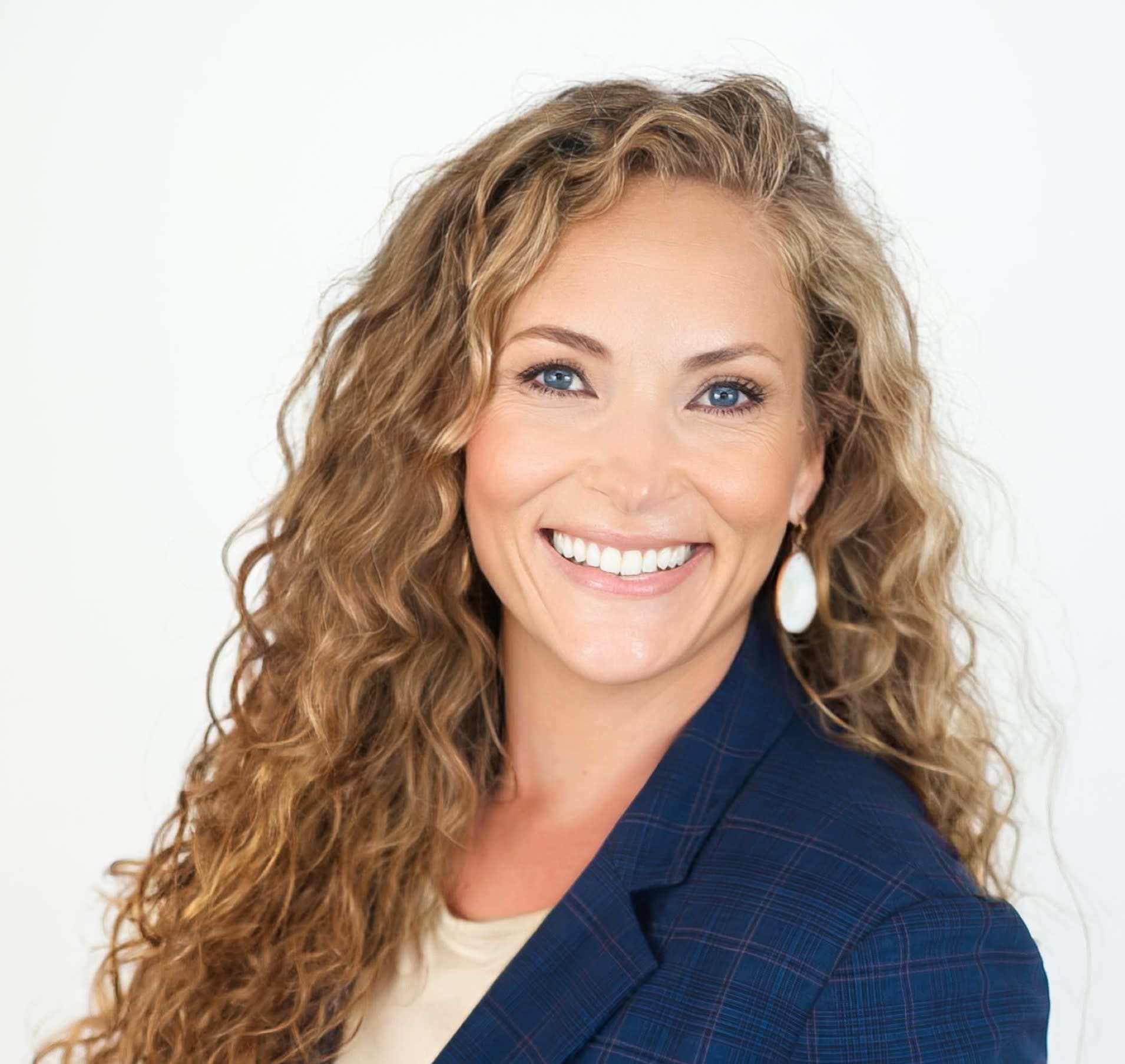 Professional headshot of Audrey Frazier, Realtor® + Business Consultant serving Tallahassee, Florida.