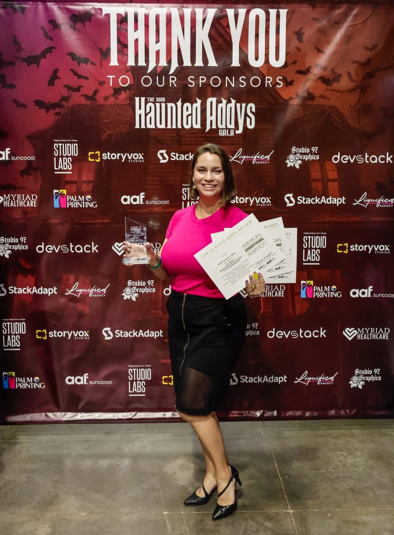 Marianne Sibille receiving the ADDY Awards