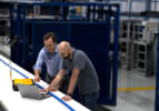 ThayerMahan Array Manufacturing Team Inspects a Linear Hydrophone Array