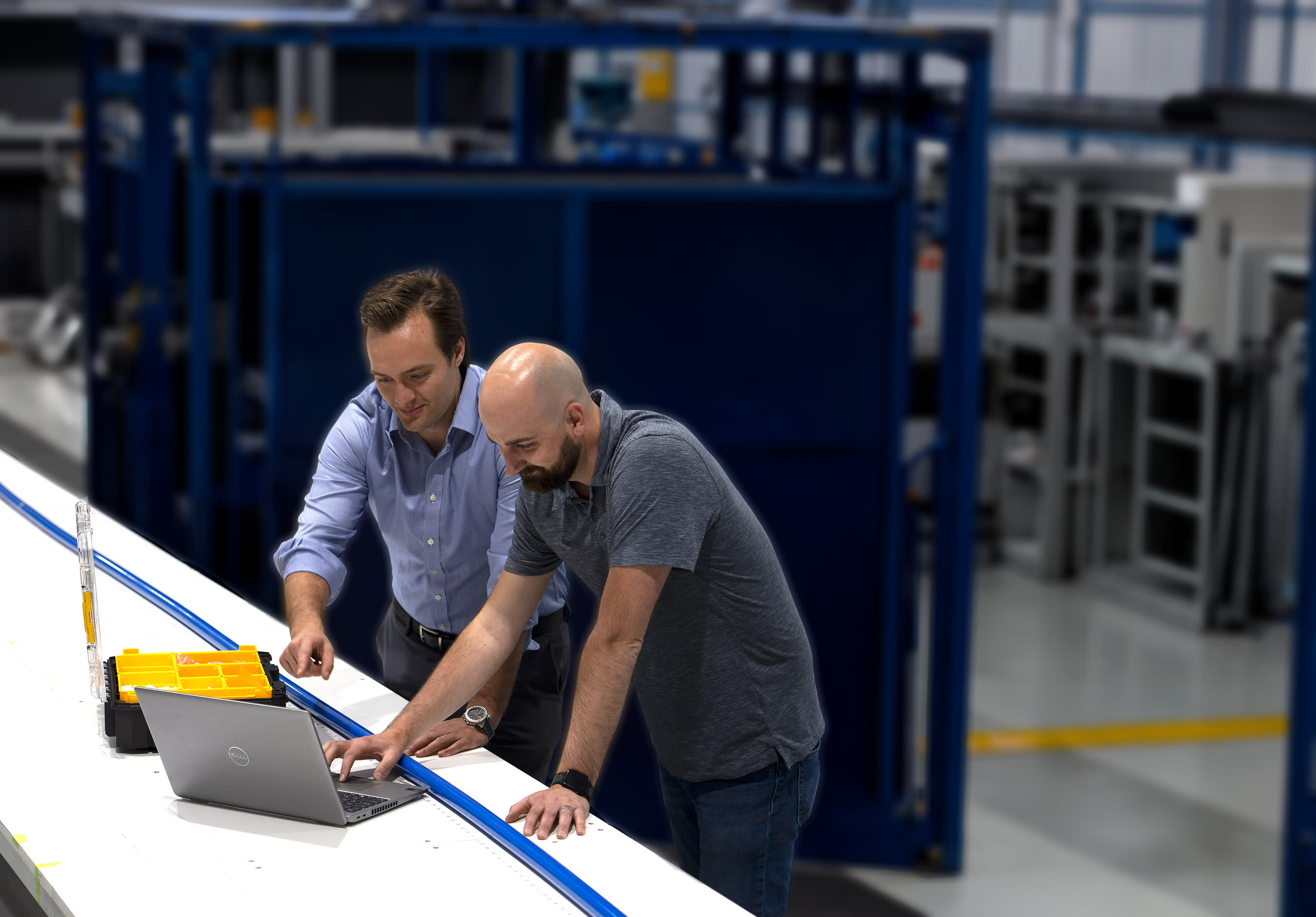 ThayerMahan Array Manufacturing Team Inspects a Linear Hydrophone Array