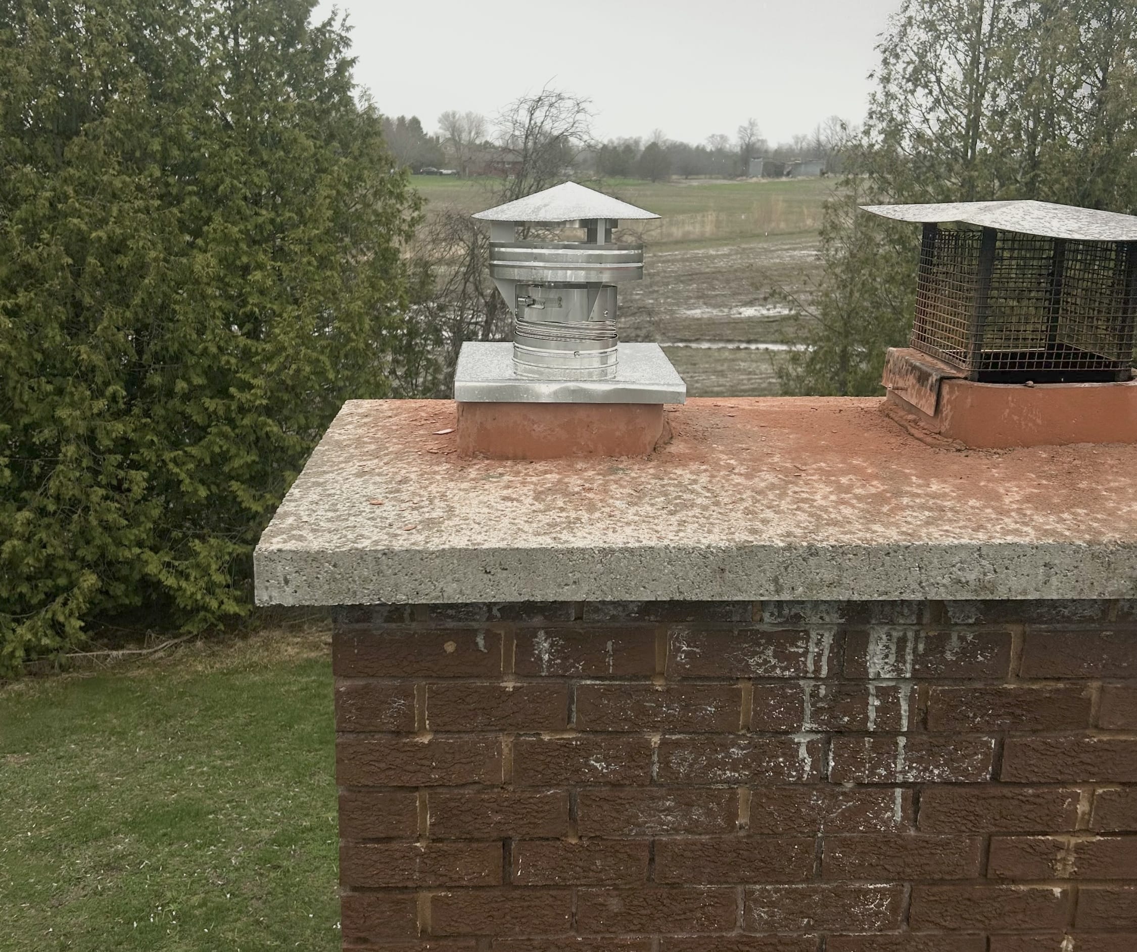 Before and after chimney cleaning showing heavy soot buildup removed for safe operation. Professional chimney service in Halt