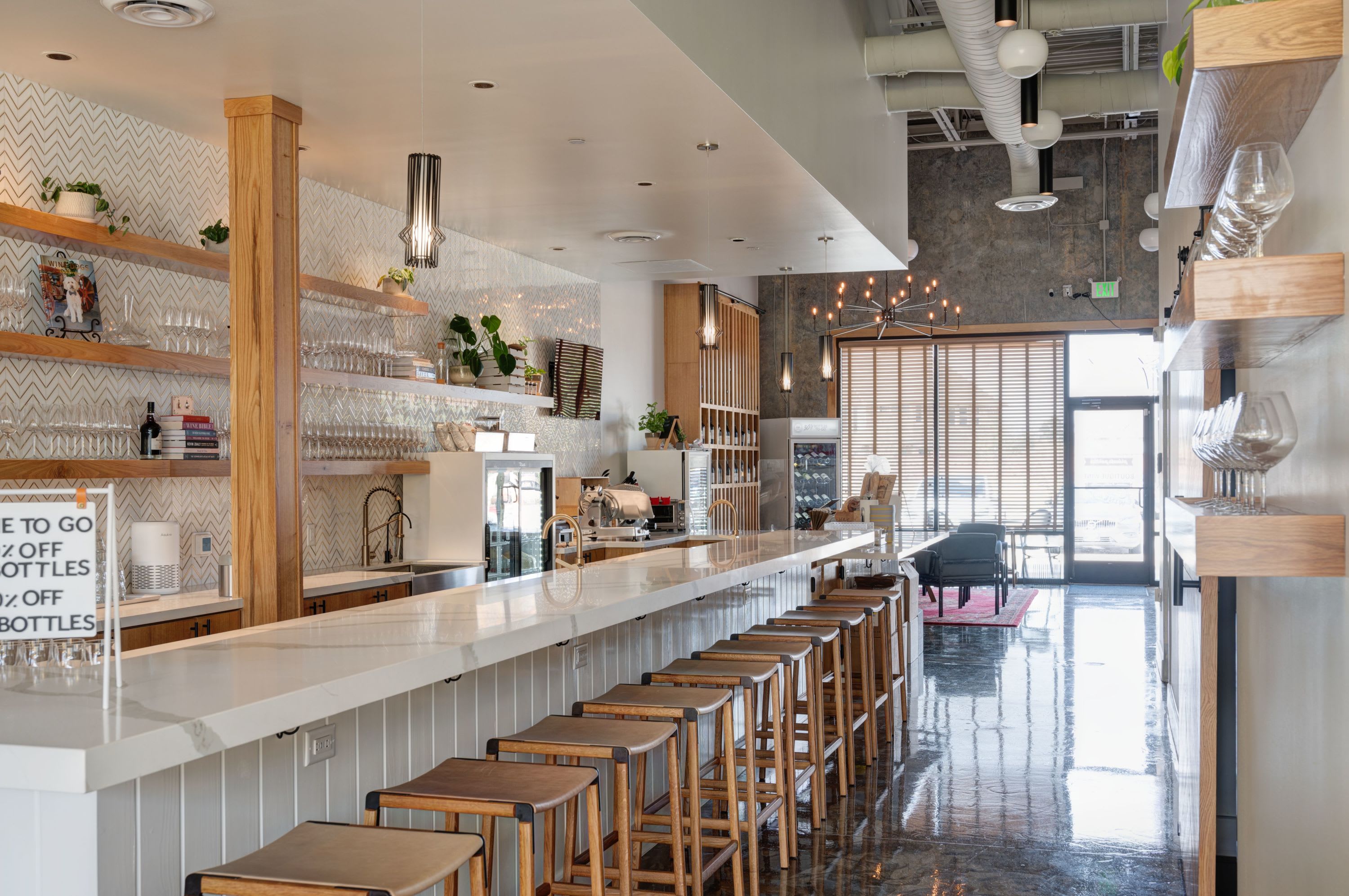 Wine bar counter seating at Sonoma Wine & Cheese in Katy, TX