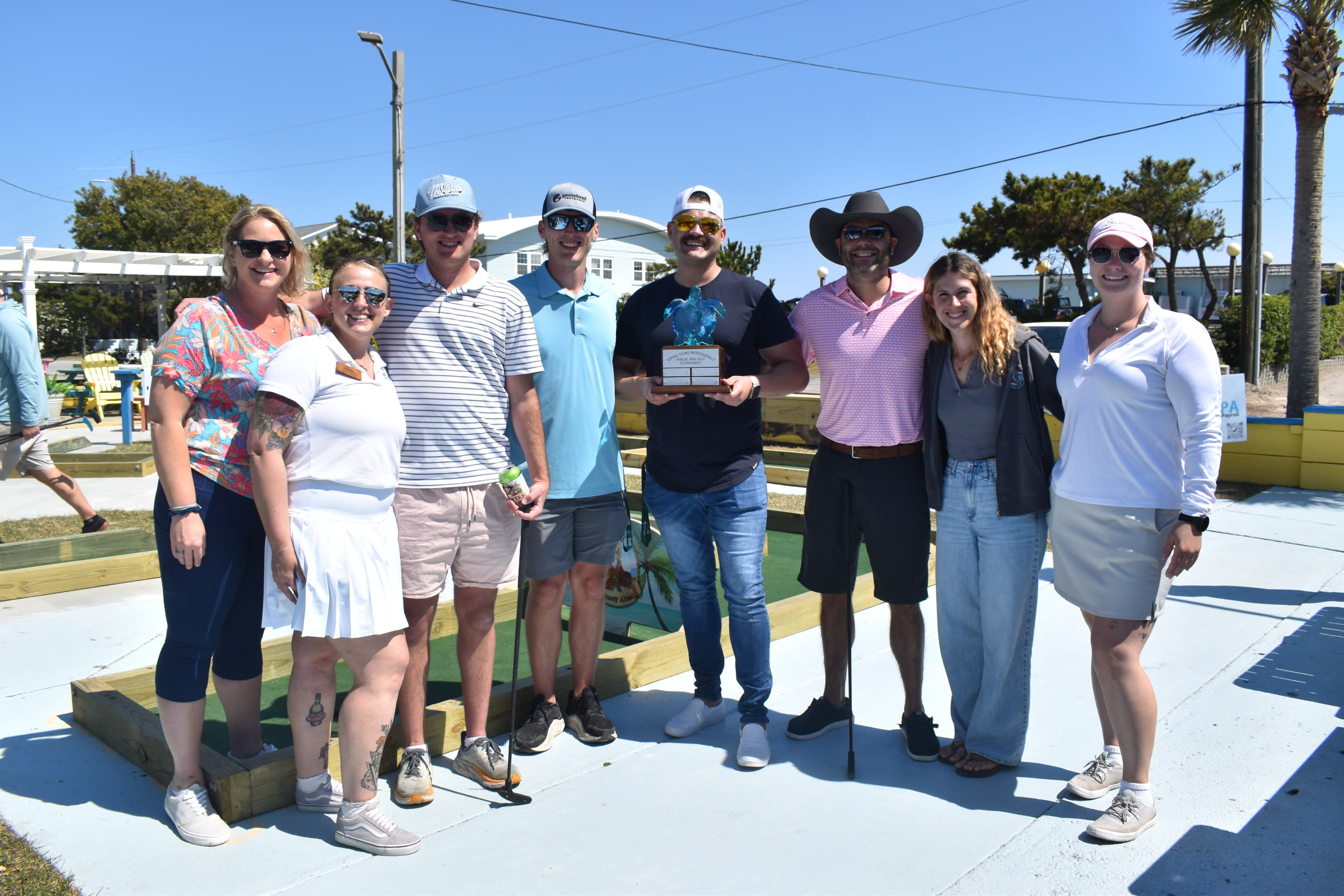 Goosehead Insurance captured the trophy at the first Topsail Young Professional's mini golf tournament last year.