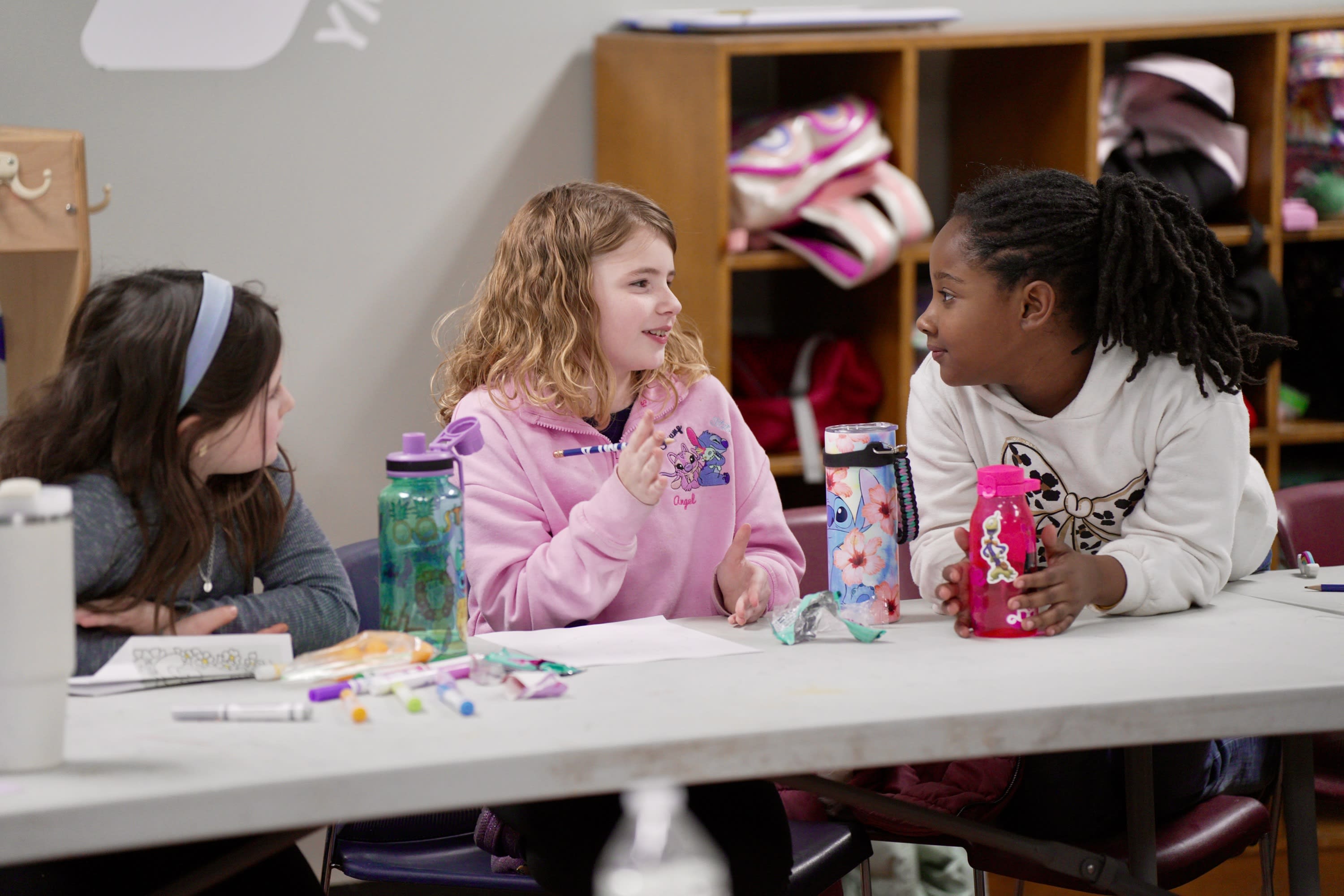 girls talking at the YMCA afterschool program