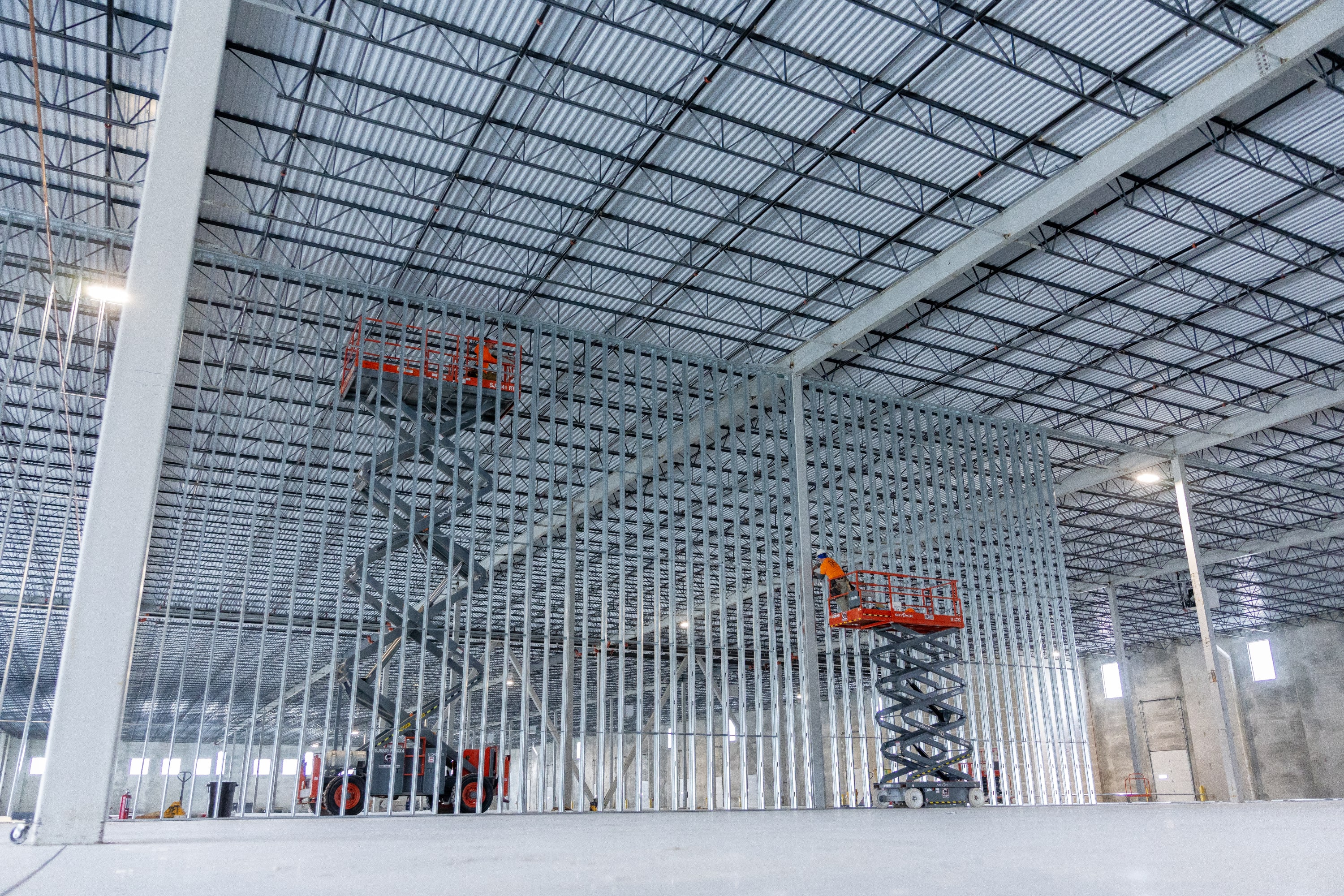 JC Toland completing metal stud framing for a project.