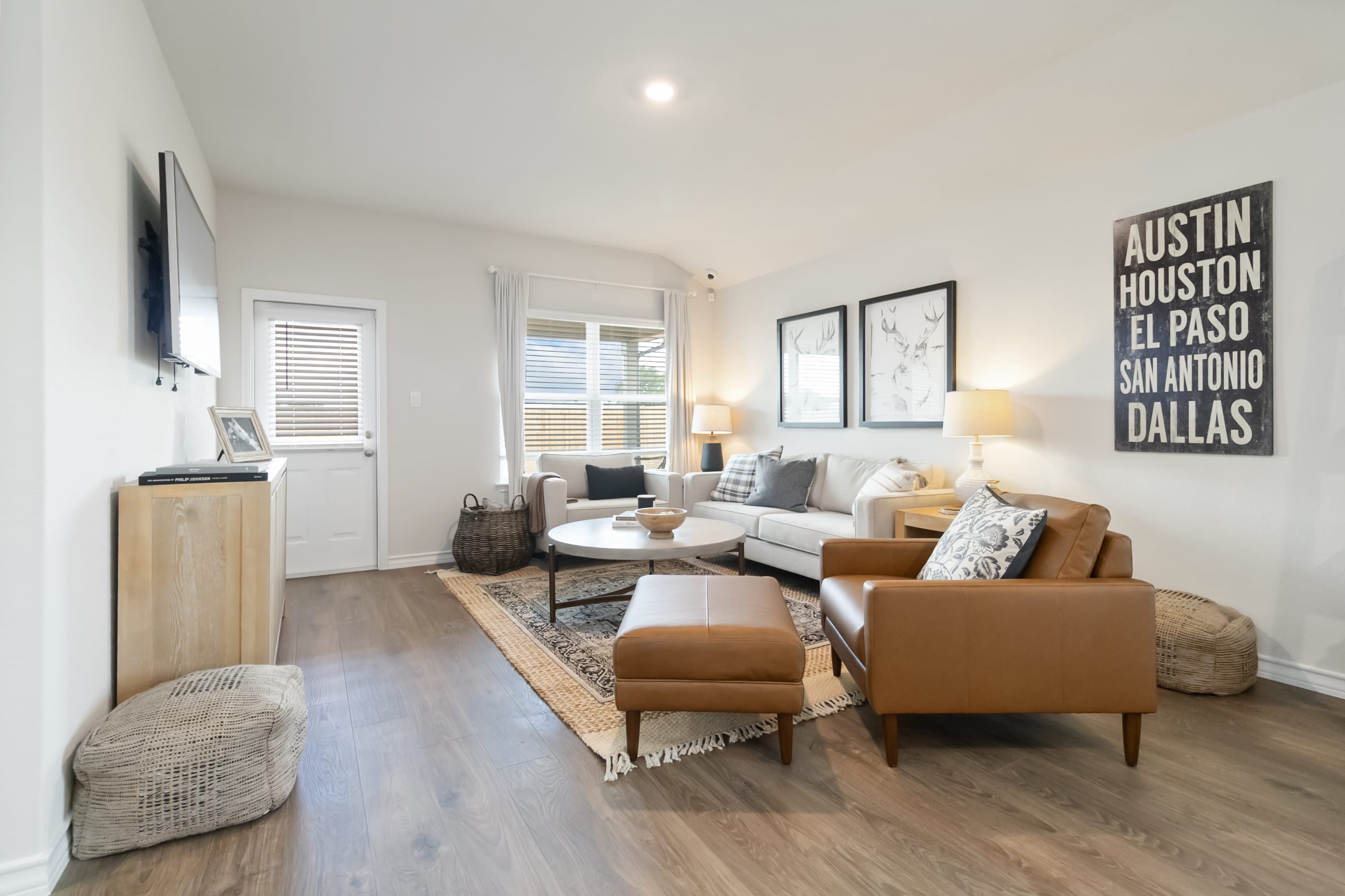 living room with hard surface flooring and large windows