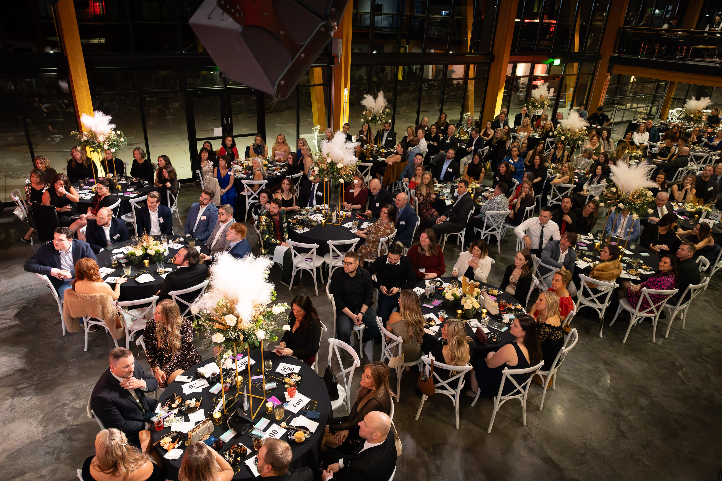 Corporate gala and nonprofit event photography capturing audience atmosphere and event experience in Wisconsin