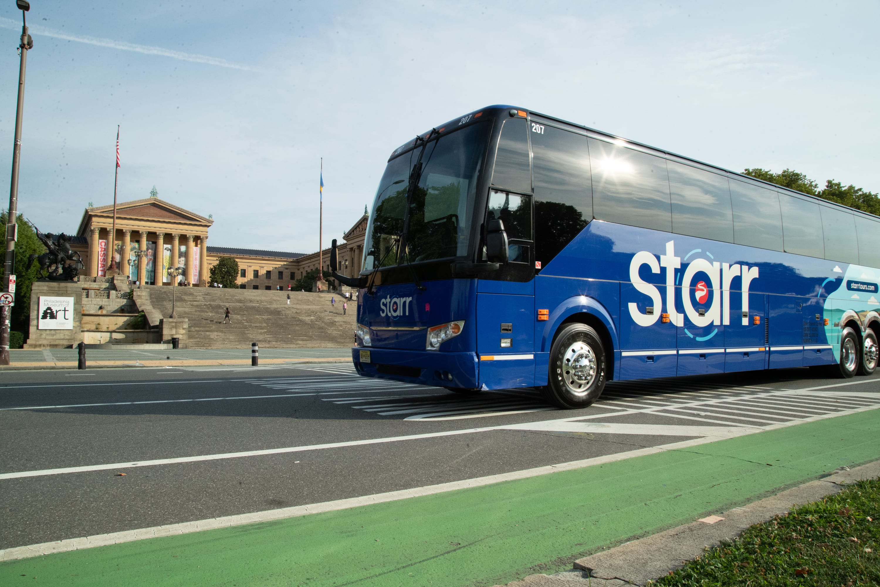 Starr Bus Charter & Tours Motorcoach in front of the Philadelphia Museum of Art