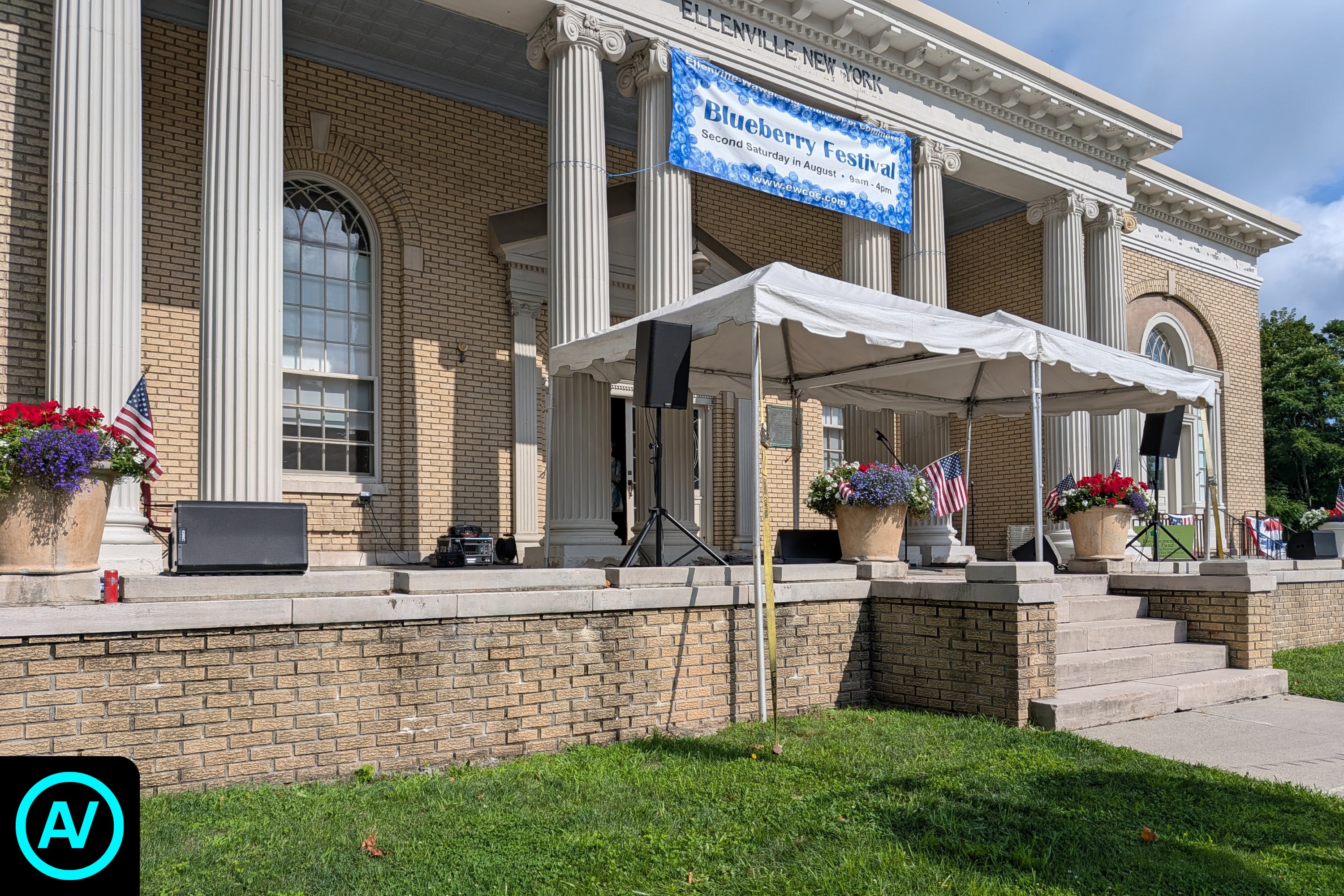 Outdoor stage and sound system at the Blueberry Festival outside the Hunt Memorial Building in Ellenville, New York