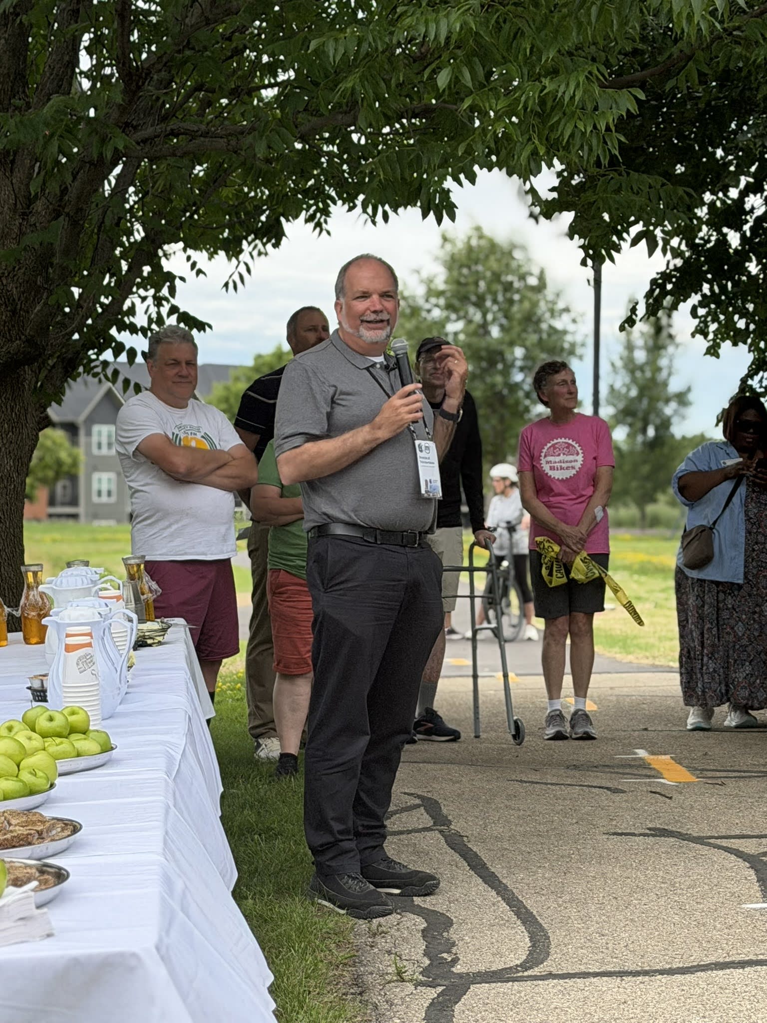 A speaker at the Tancho Path ribbon-cutting