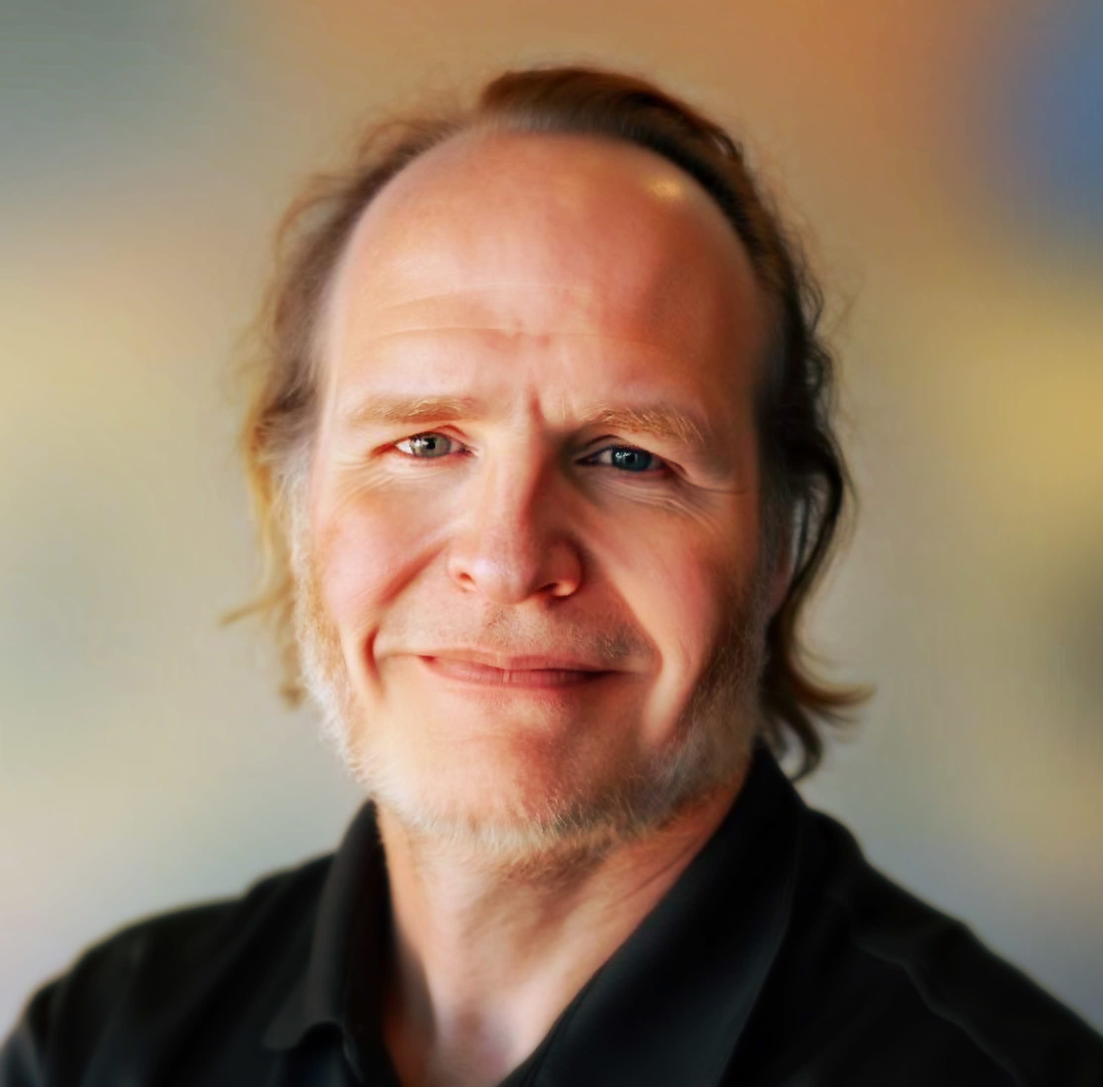 Headshot of Mike Hughes