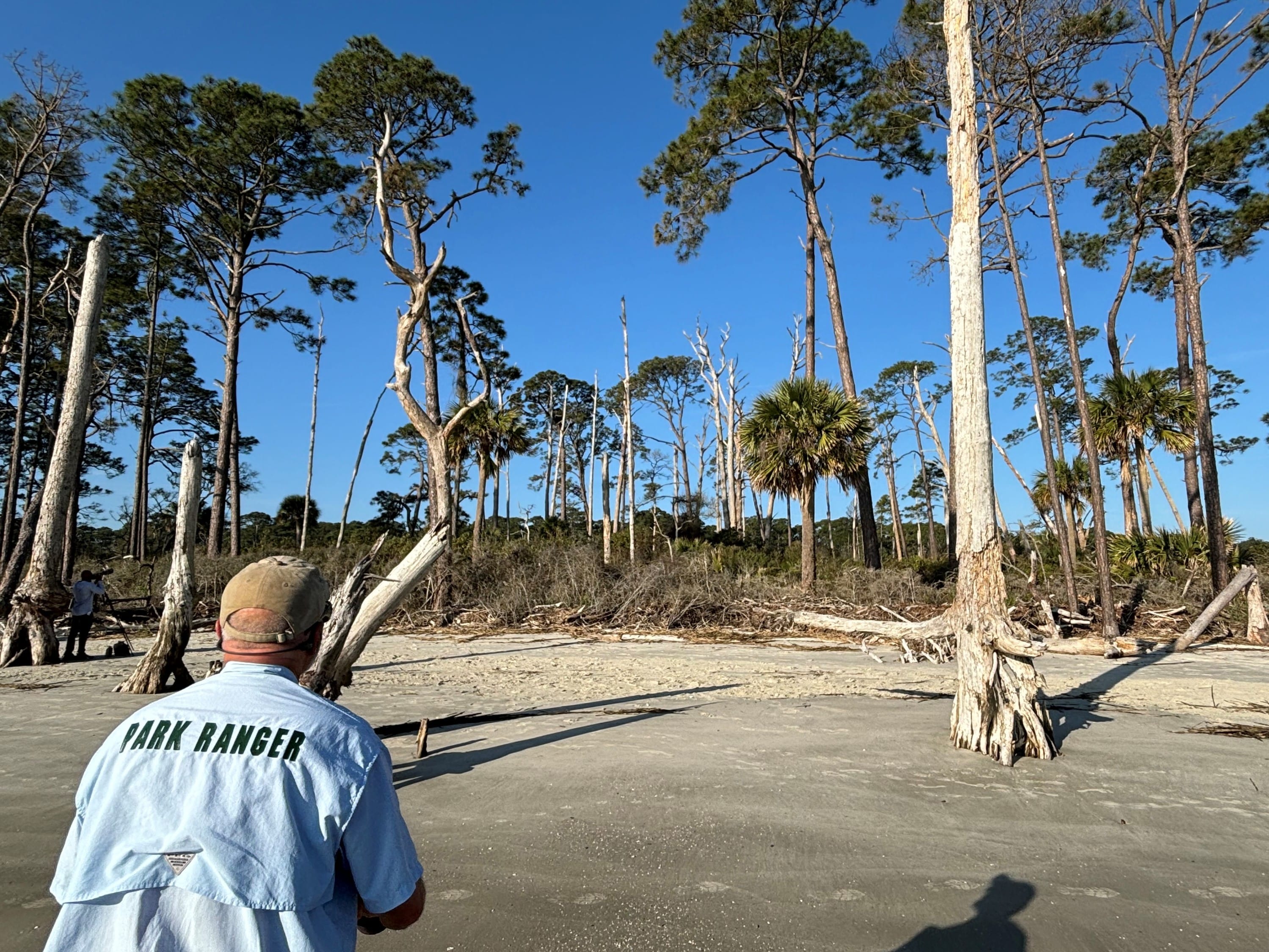 Park Ranger monitoring a distant eagle's nest on the south end of Jekyll Island.