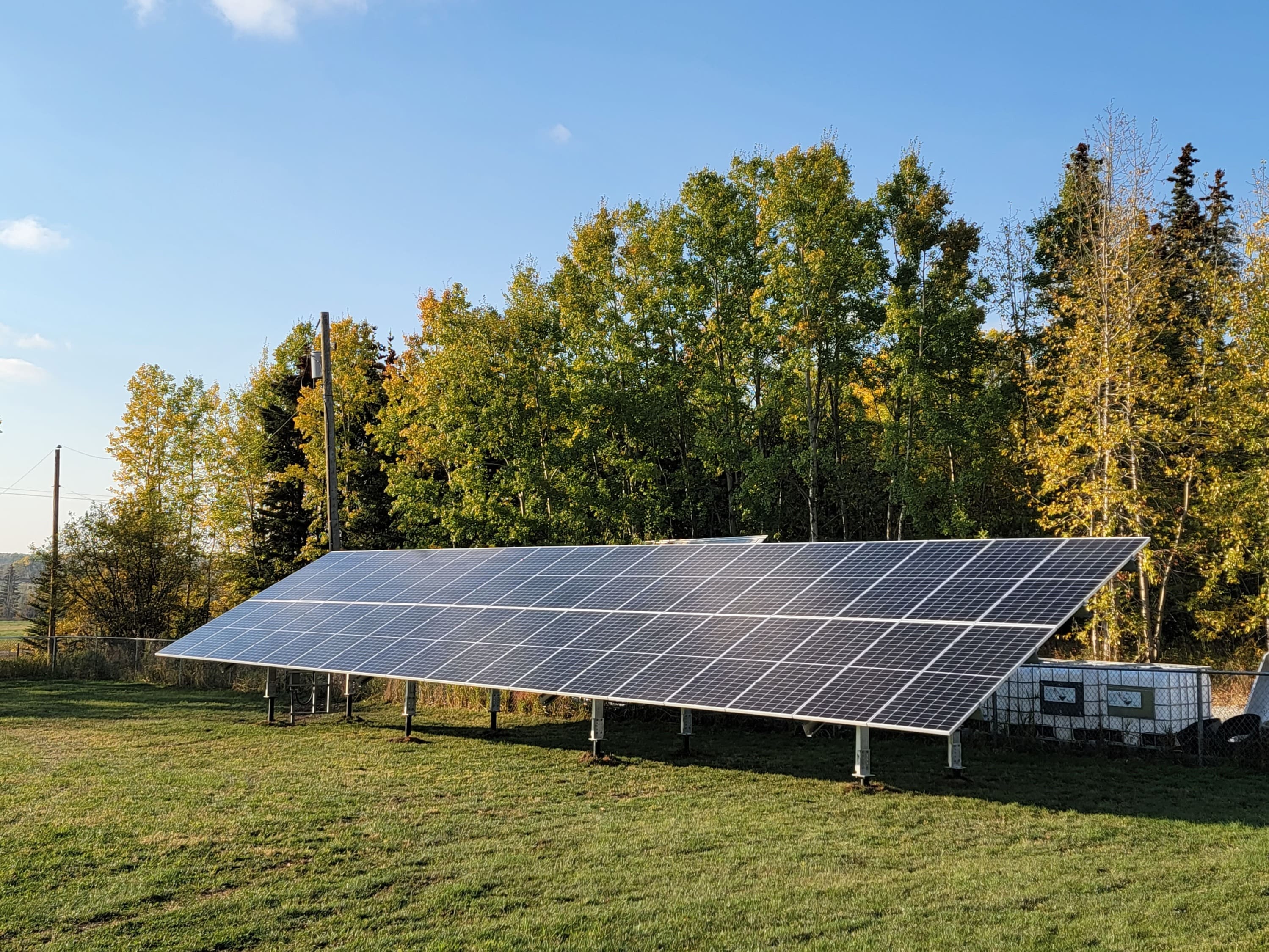 Ground-mounted solar system installed on an acreage near Beaverlodge, Alberta by Empower Energy