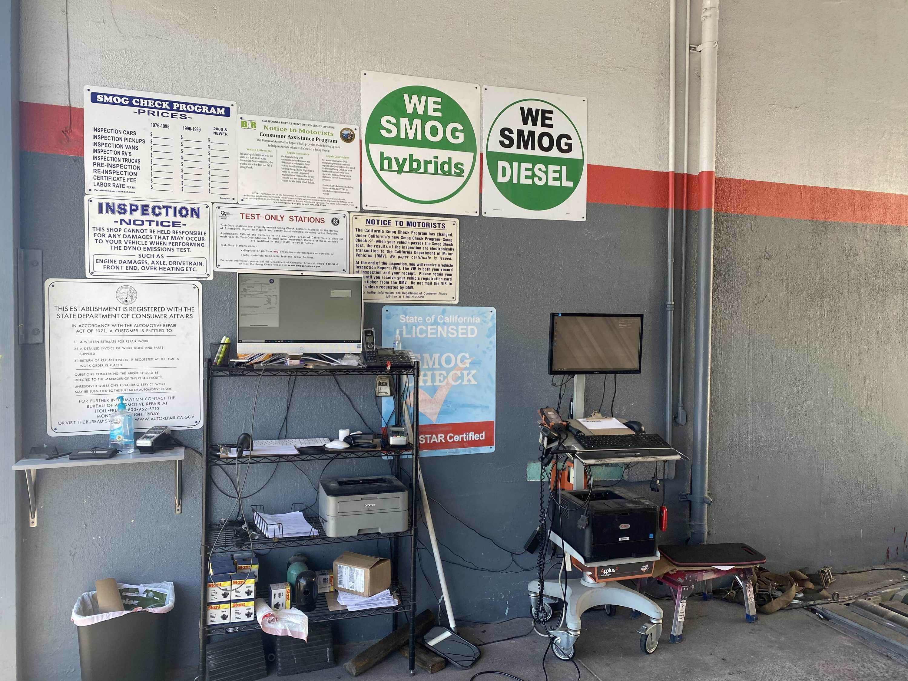 smog test equipment and notices at green smog check
