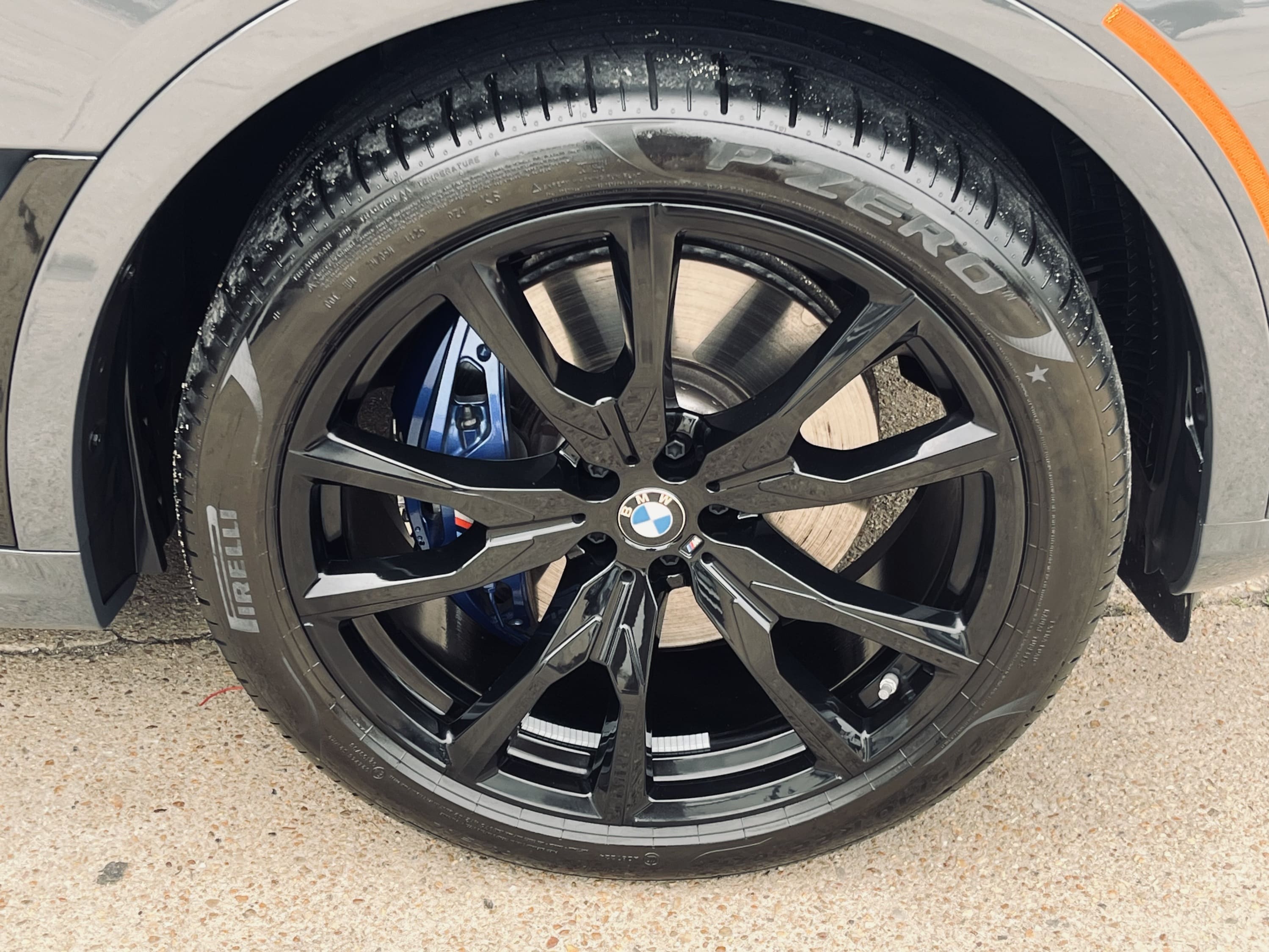 Clean vehicle wheels and tires after detailing service.
