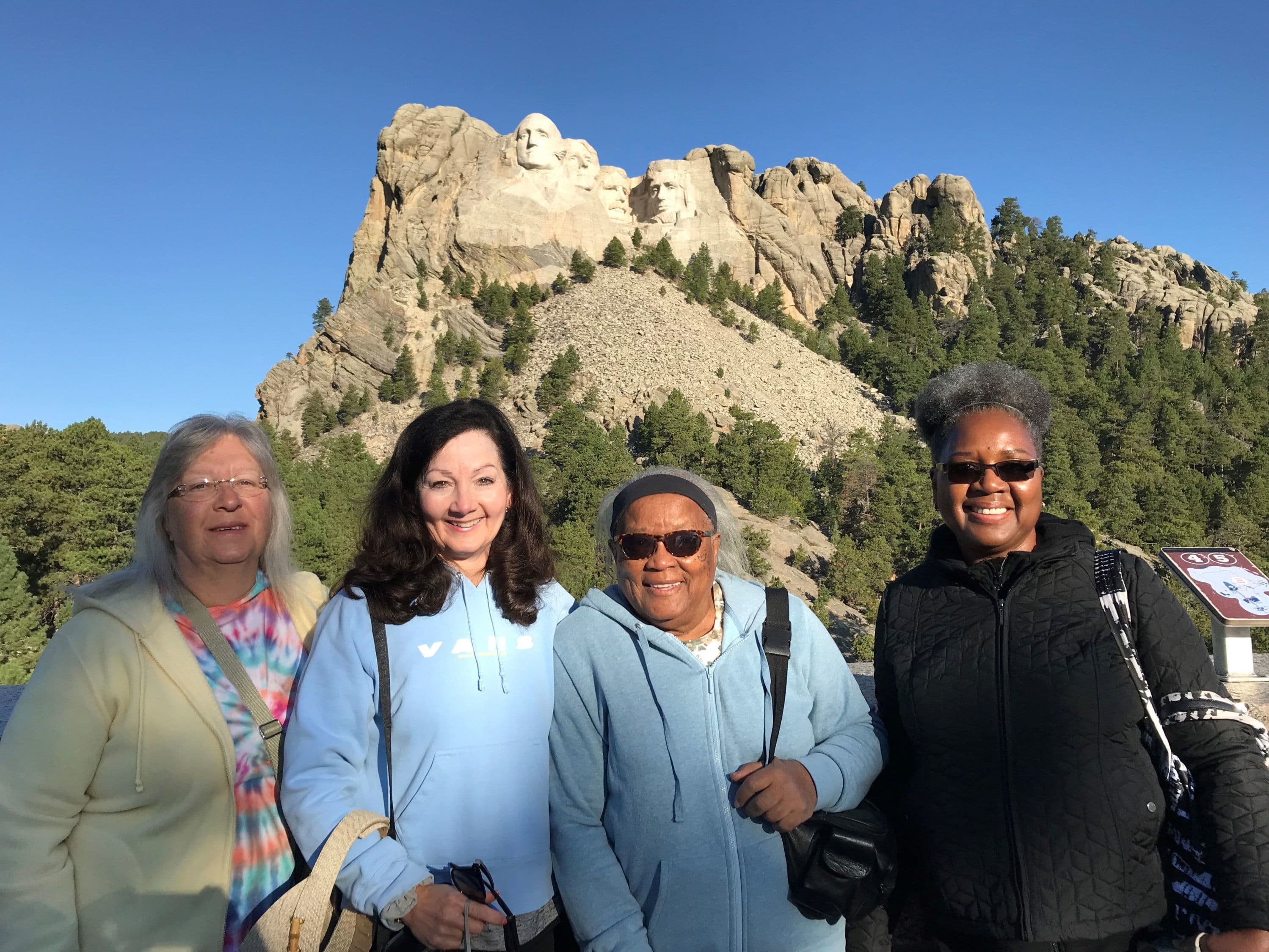 Starr Tours Passengers Visiting Mount Rushmore During Starr's Cross Country Road Trip
