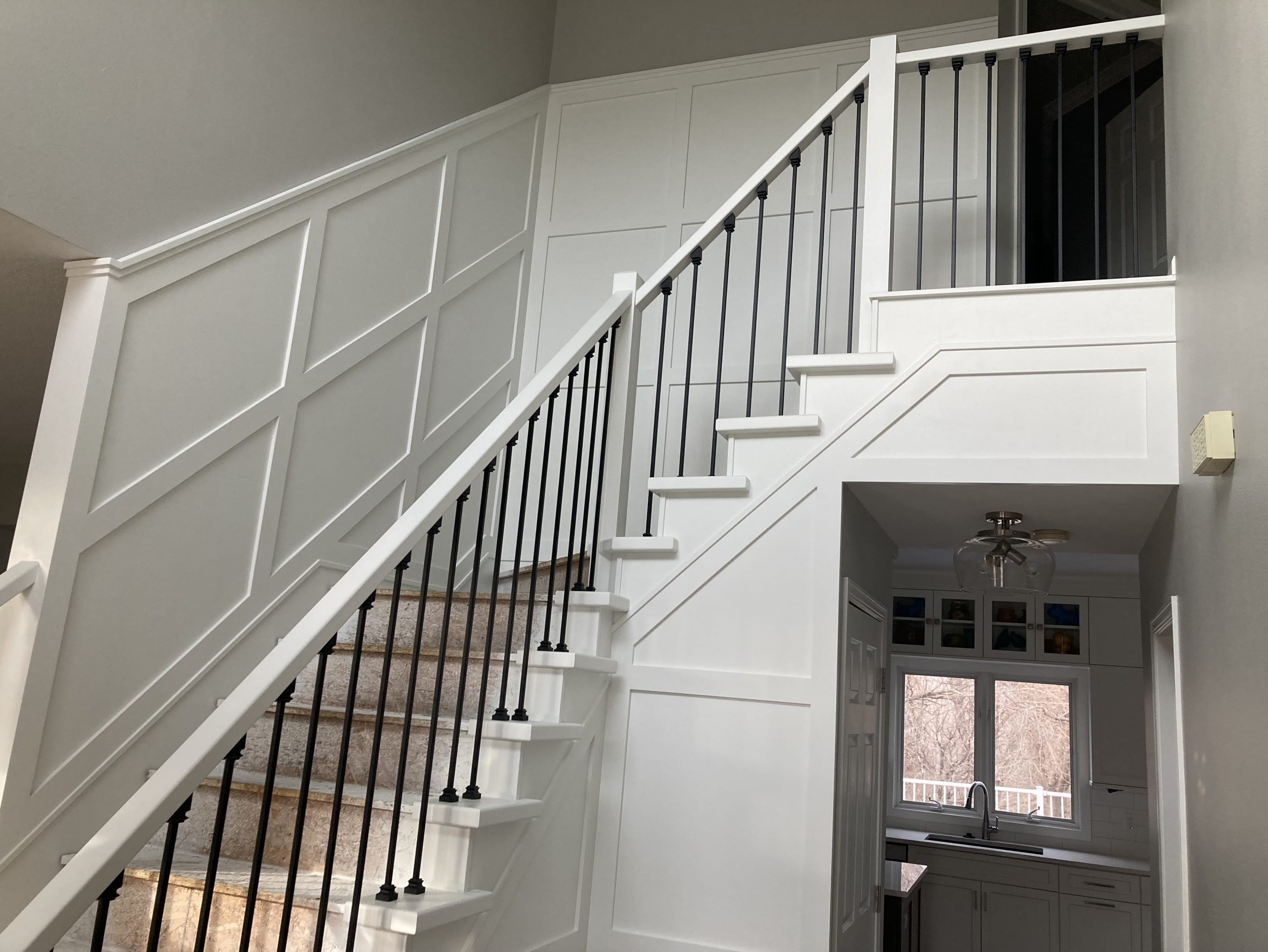 Stair rail, spindles, wainscot