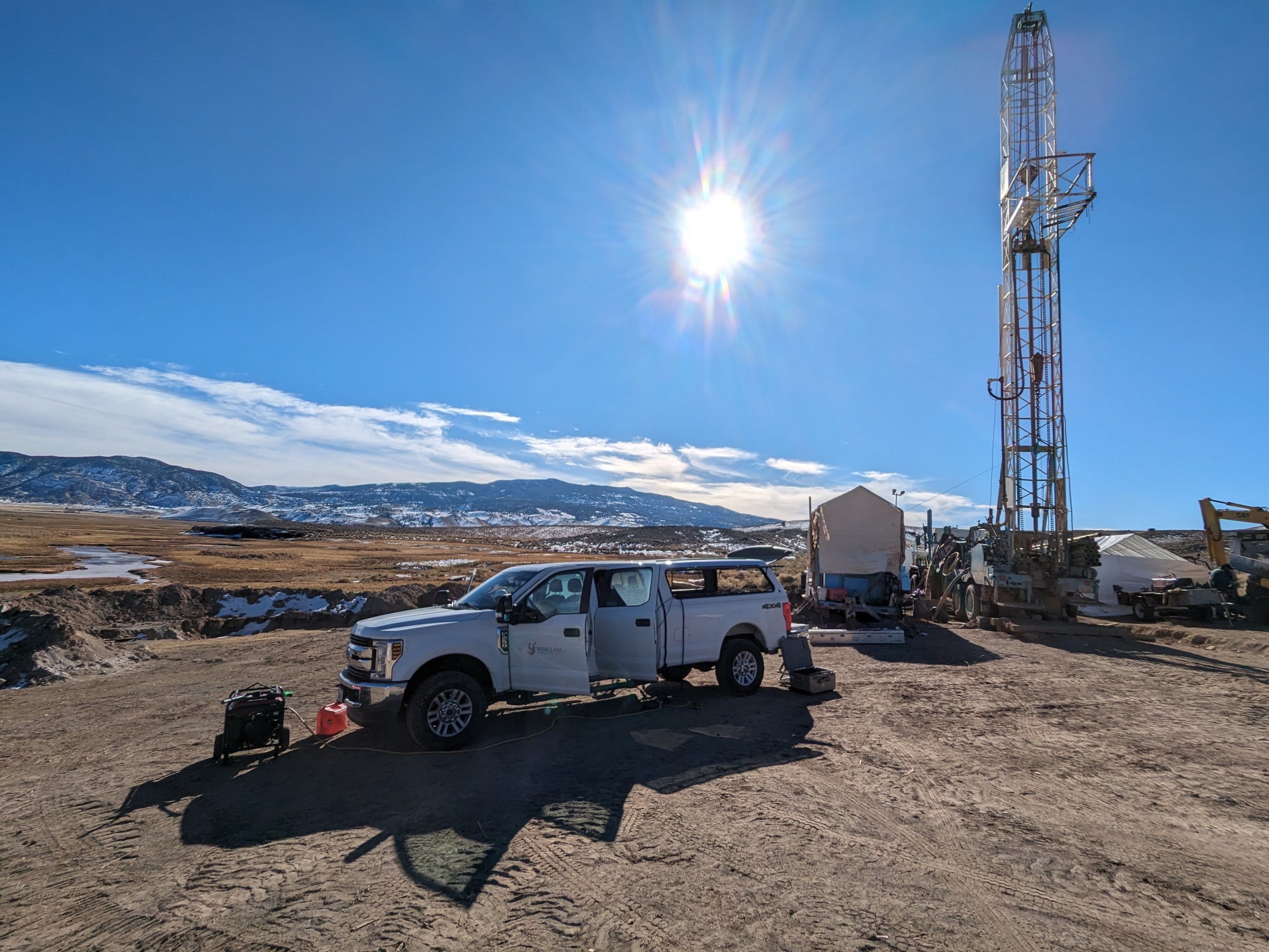 Vista Clara geophysical well logging vehicle and crew performing measurements in a 16 inch diameter pilot well in Utah.
