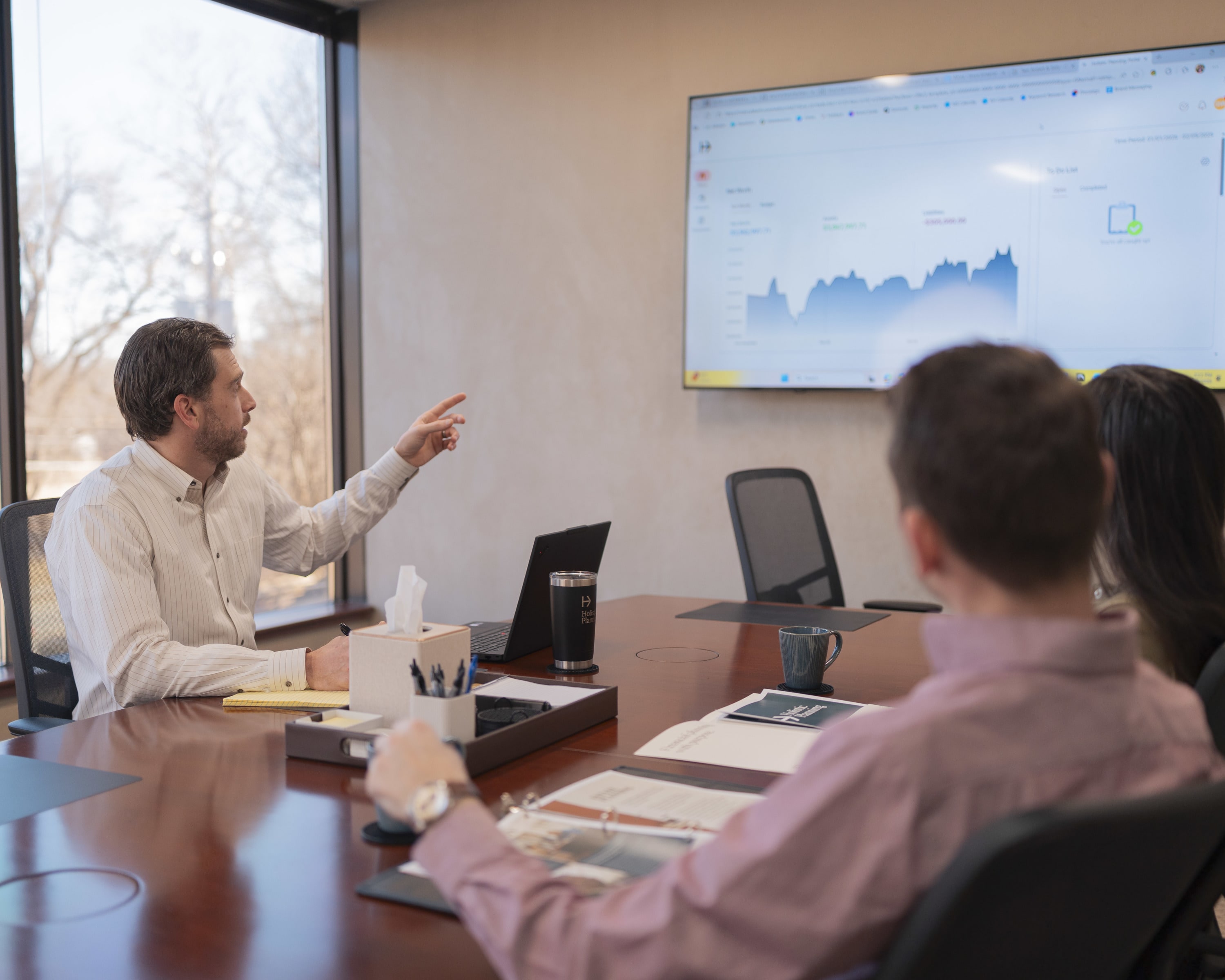 Financial advisor meeting with clients