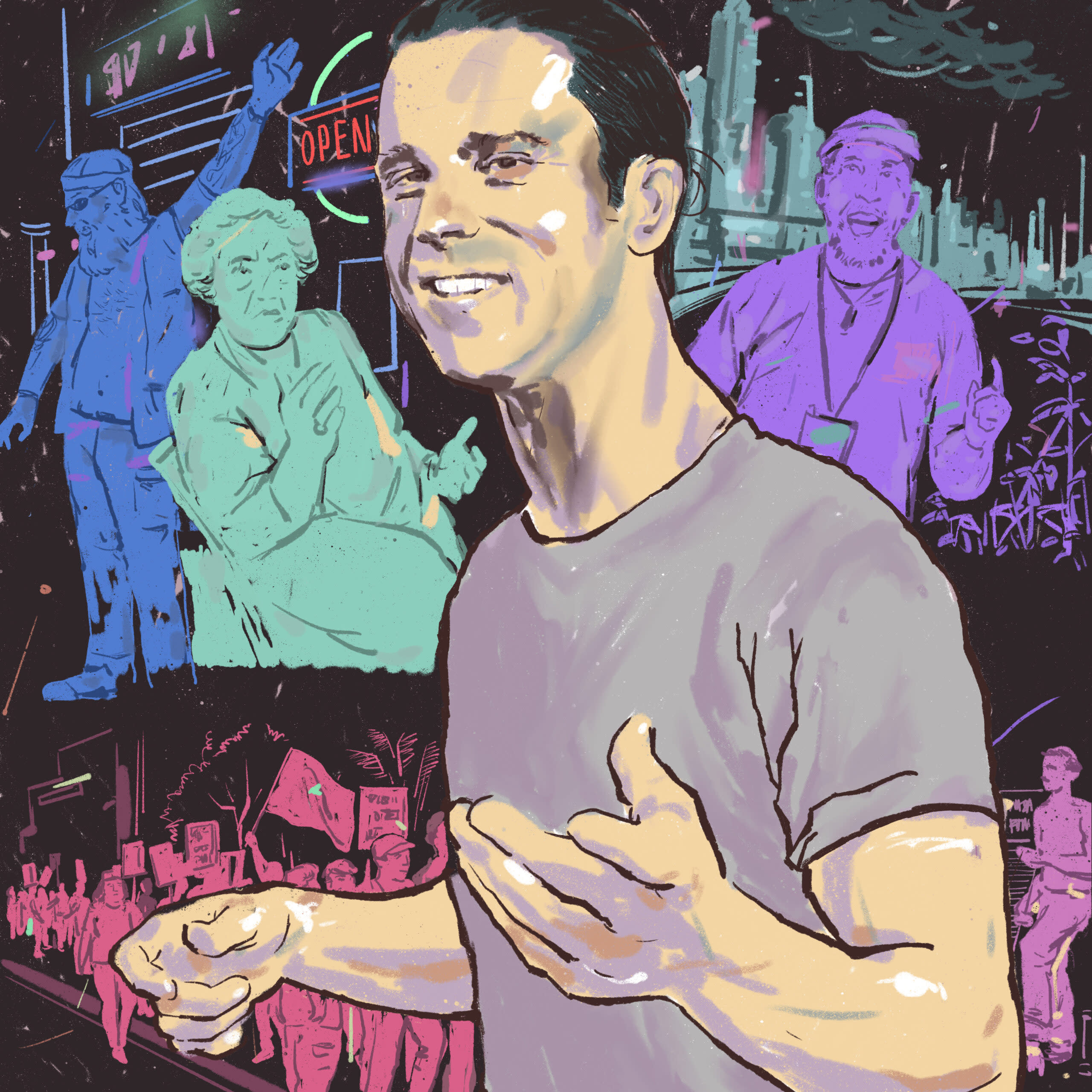 In this image, Dan Hoyle is performing in front of a crowd and smiling.