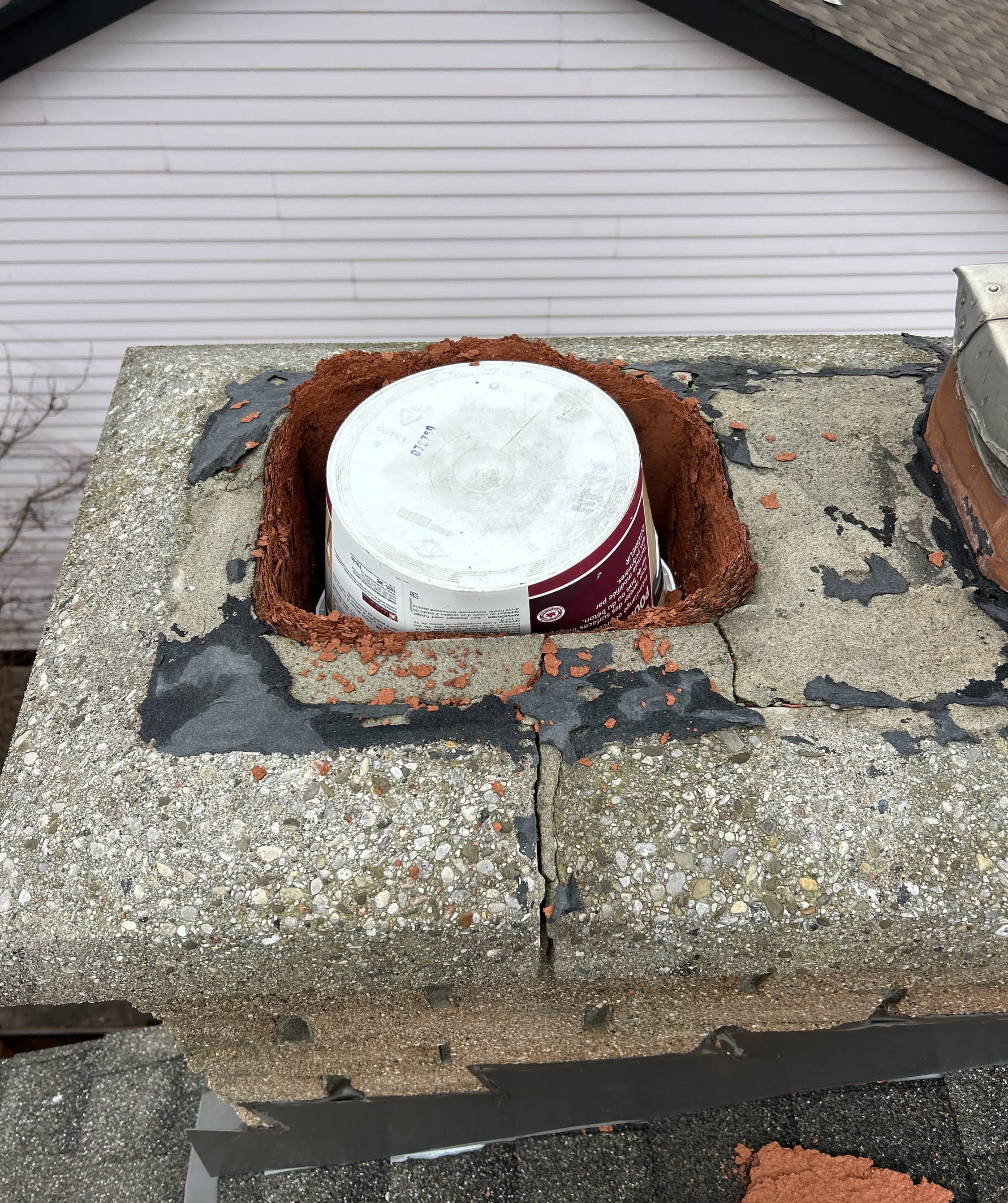 Blocked chimney flue and damaged crown identified during inspection in Halton Hills