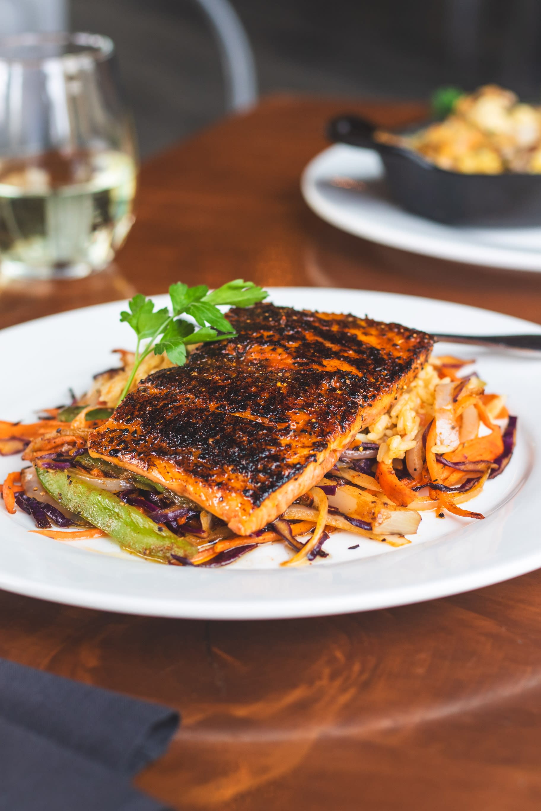 fresh local steel head, blackened with creole vegetables and rice