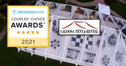 Aerial view of event tent with tables and a checkered dance floor plus award badge.