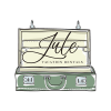 Jule Vacation Rentals logo with an illustrated open suitcase