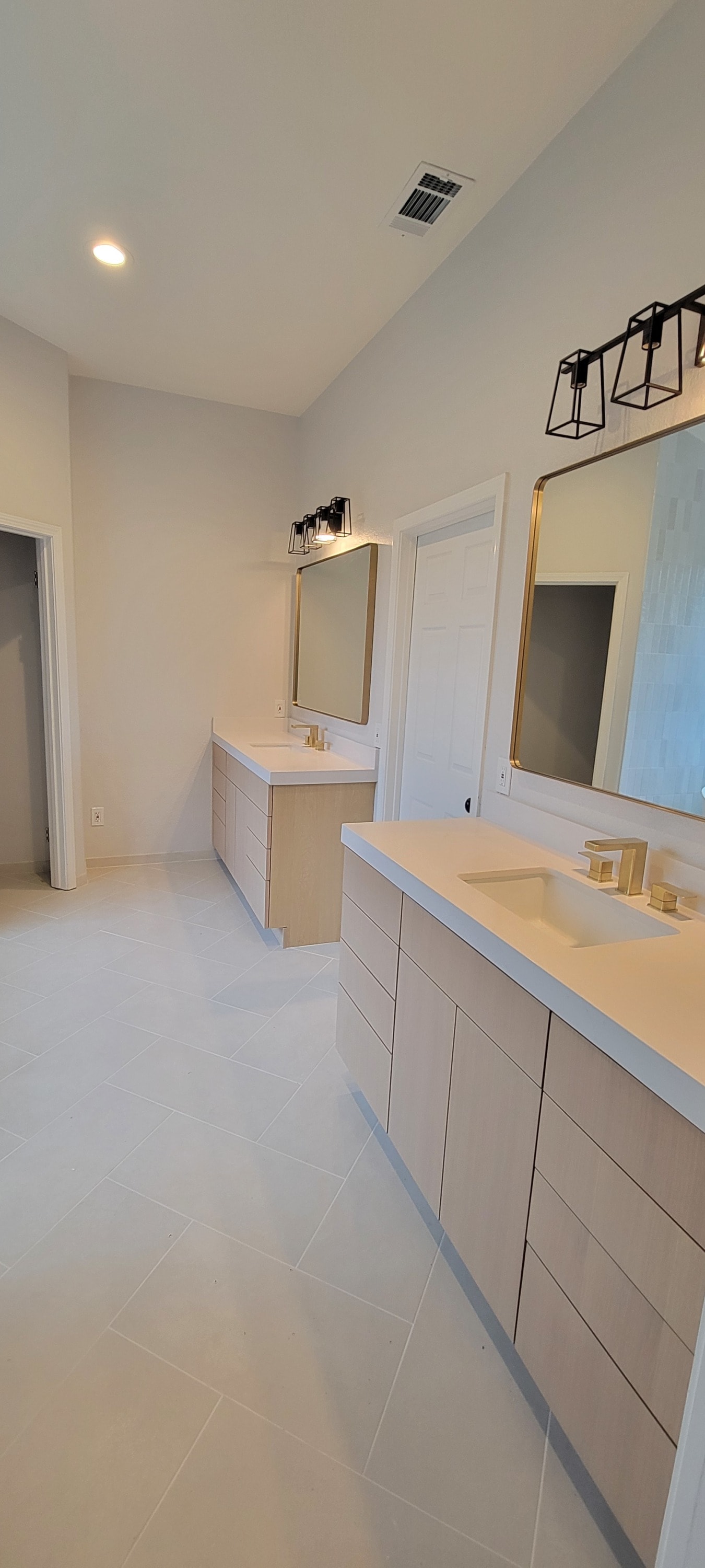 Double Vanity Install by Lions Gate Remodeling