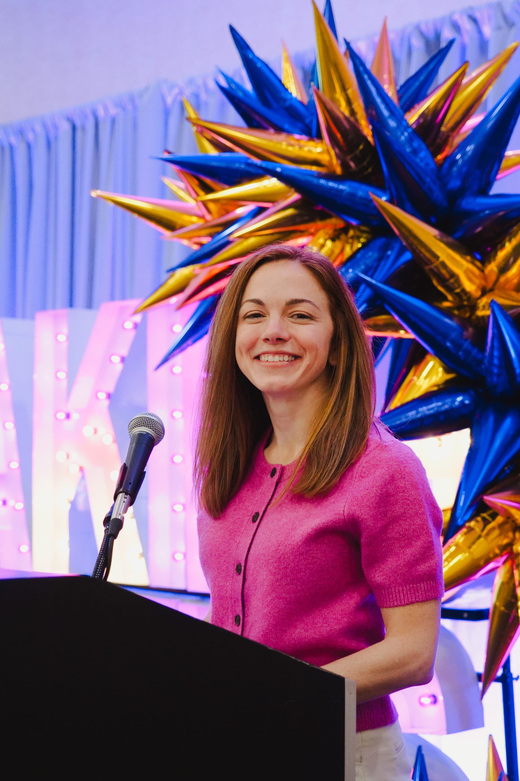 Beth Rudge, CRNP, WHNP-BC, program coordinator, UPMC Breast Cancer Survivorship addressing the packed hall at the Penn Harris