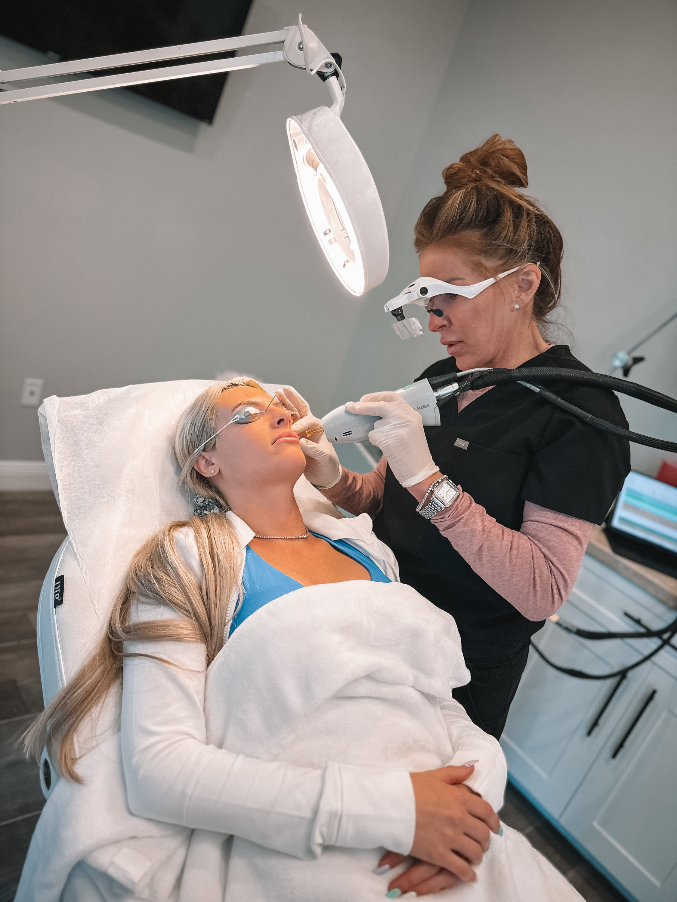 Patient receiving a facial photofacial treatment at Refresh - Aesthetics & Wellness in Florida