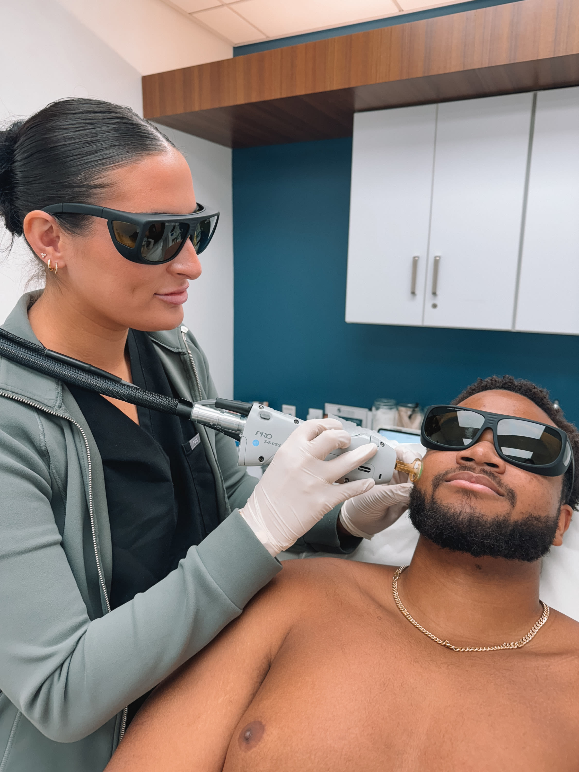 Male patient receiving facial laser hair removal with Candela technology at Refresh - Aesthetics & Wellness in Florida