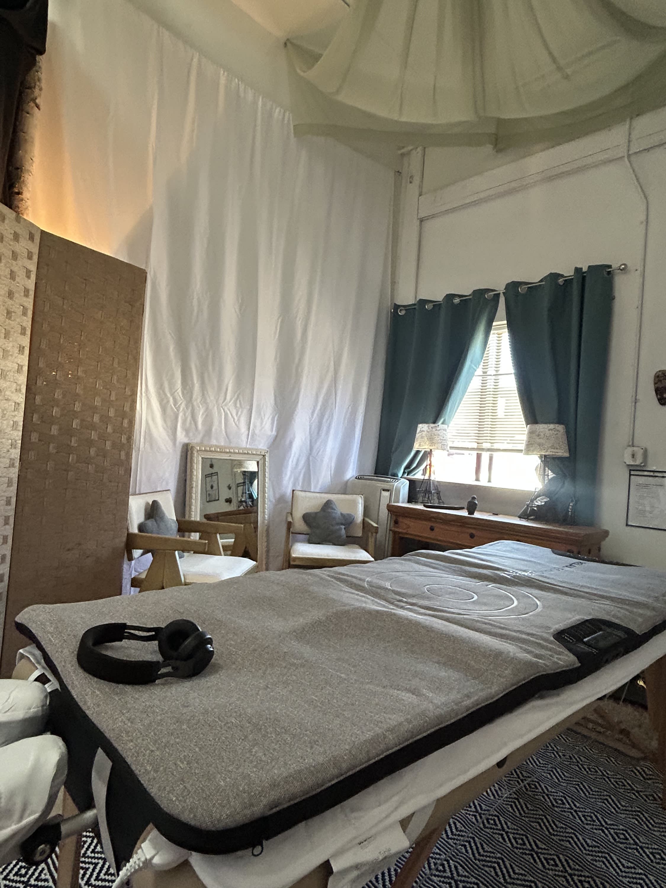 Private healing room at Sedona Dances featuring a haptic wellness mat and headphones for immersive sound therapy sessions in