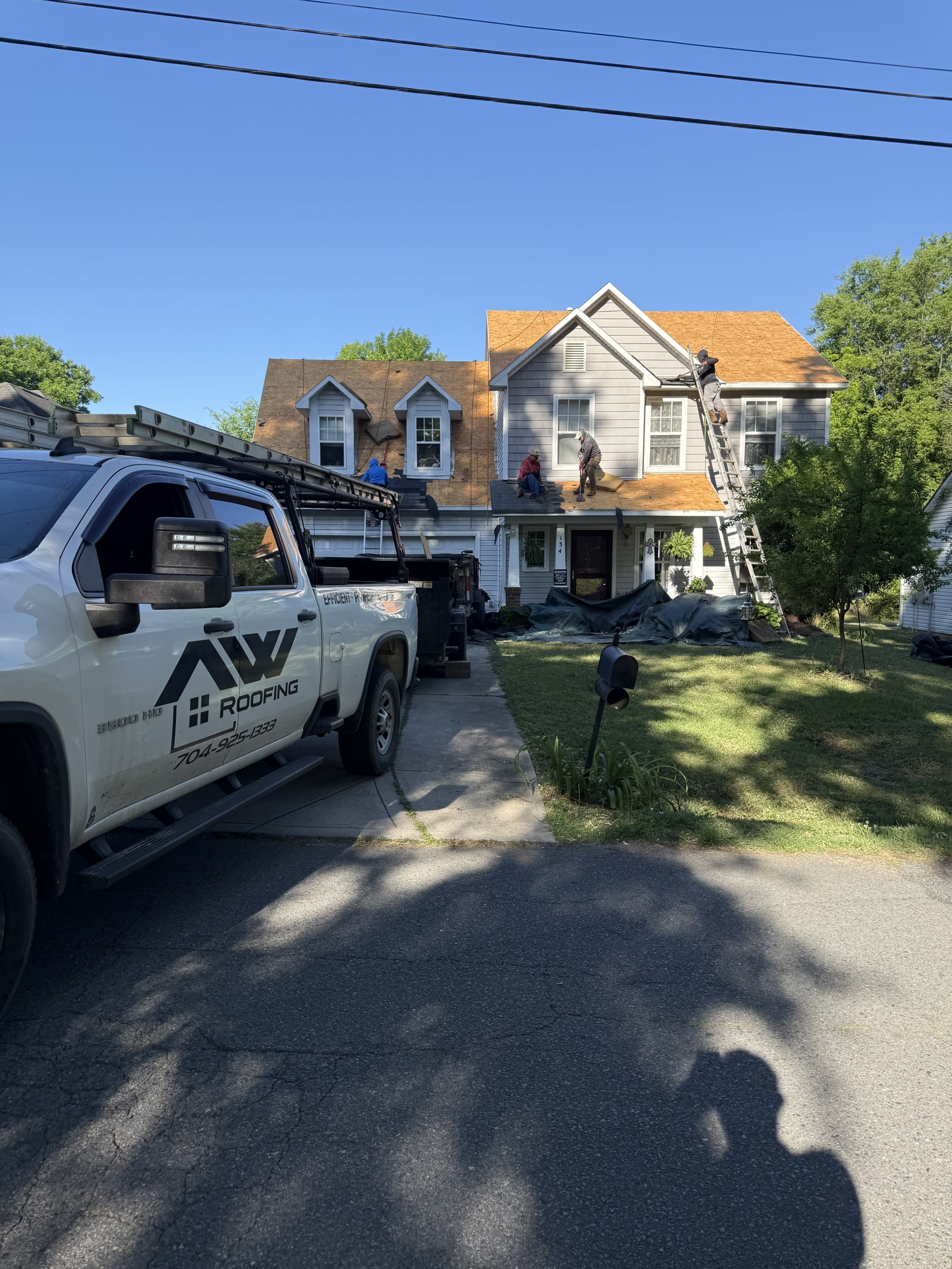 New shingle roof and gutter system.