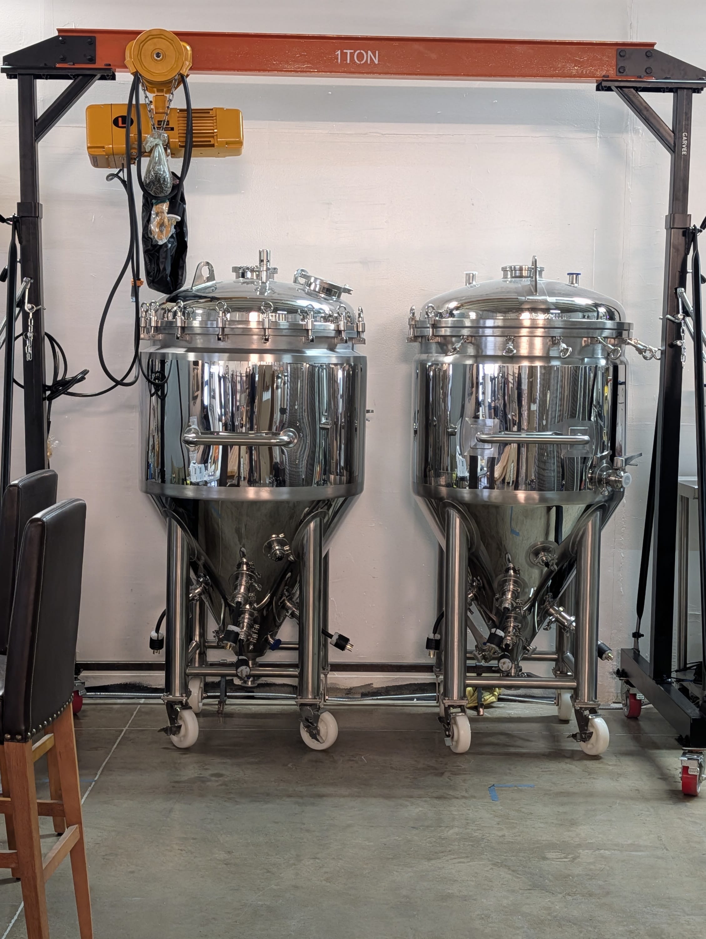 Two stainless steel fermentation tanks used to brew Rev Kombucha in Boulder