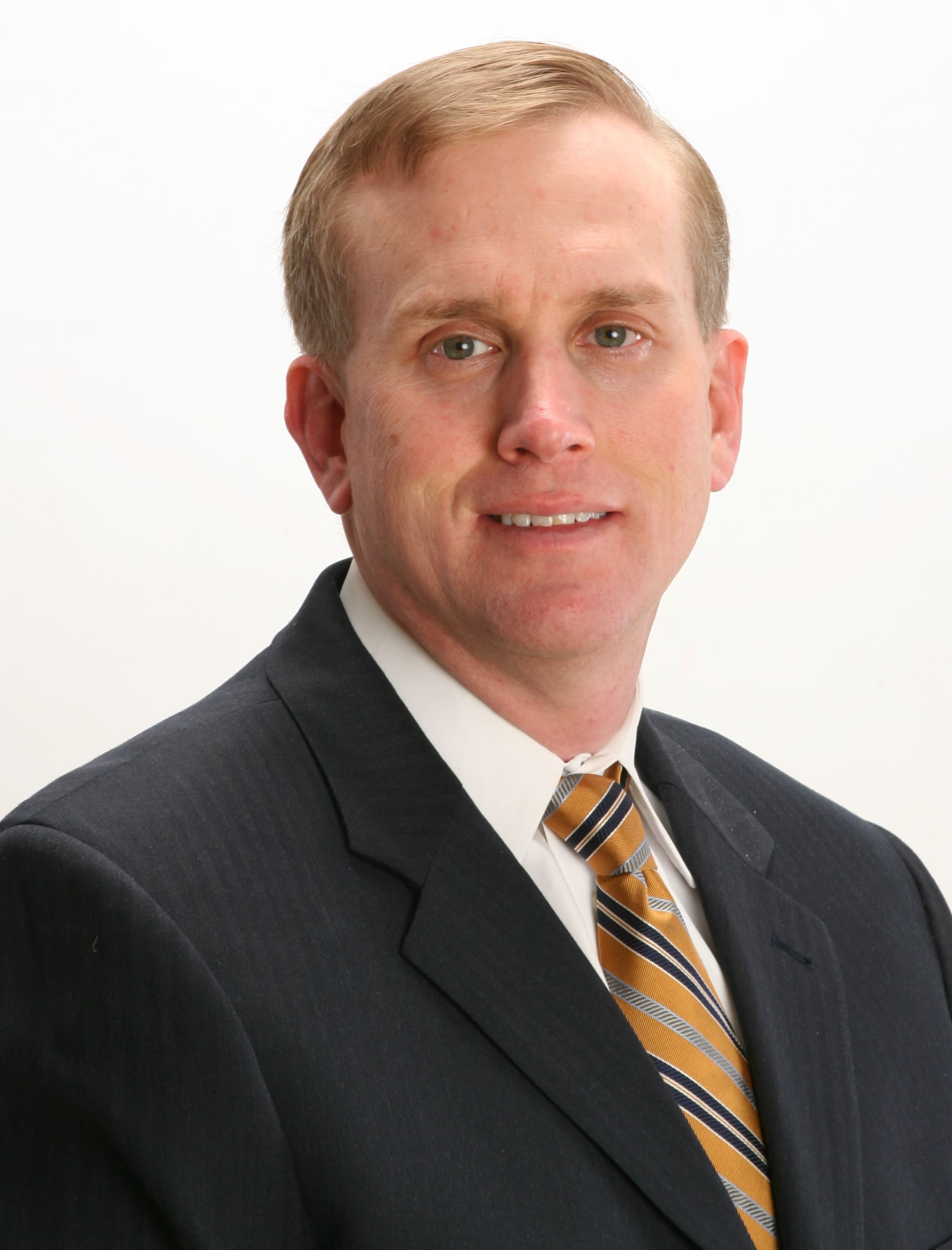 photo of man in grey suit