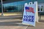 photo of vote here sign