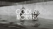 black and white photo of hands shadowed against a grey wall above water. the title Gods & Monsters in front of the image