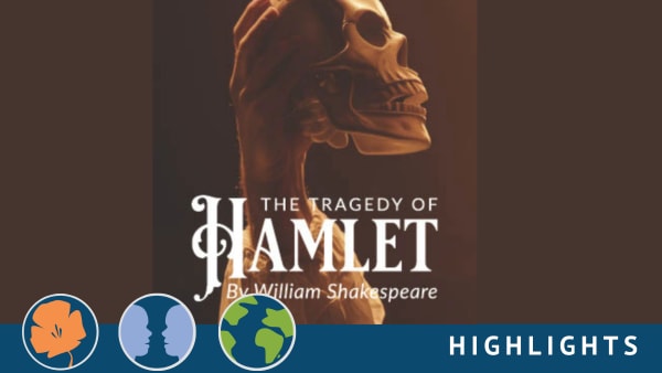 An arm holding a skull the tragedy of hamlet