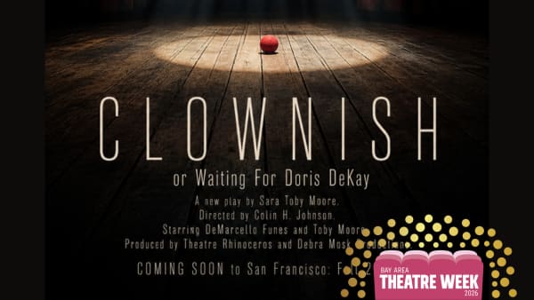 A lone clown nose sits onstage in a spooooky spotlight.