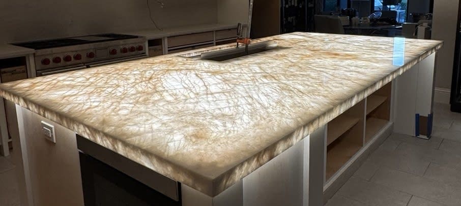 Luxury backlit cristallo kitchen  island with integrated sink and high-end finish