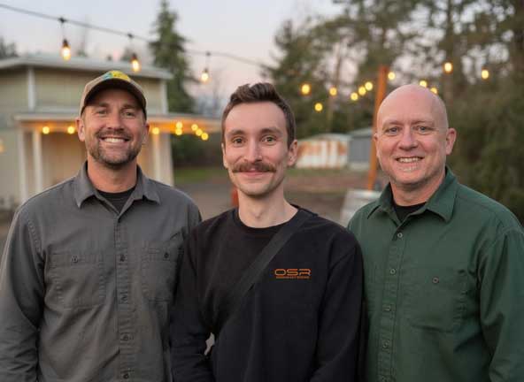 Photo of the three owners of Obsidian Sky Roofing