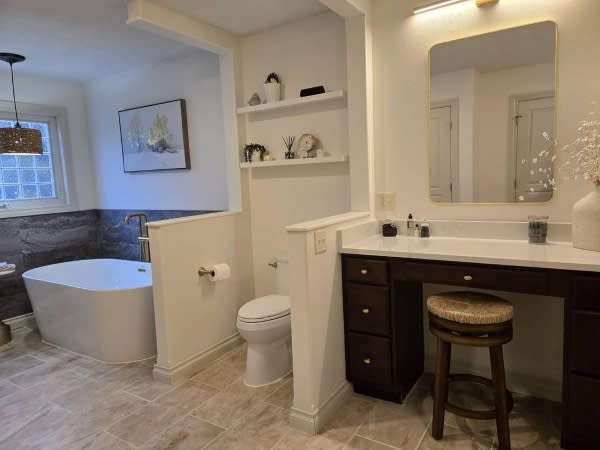 Modern bathroom lighting and fixtures after remodel.